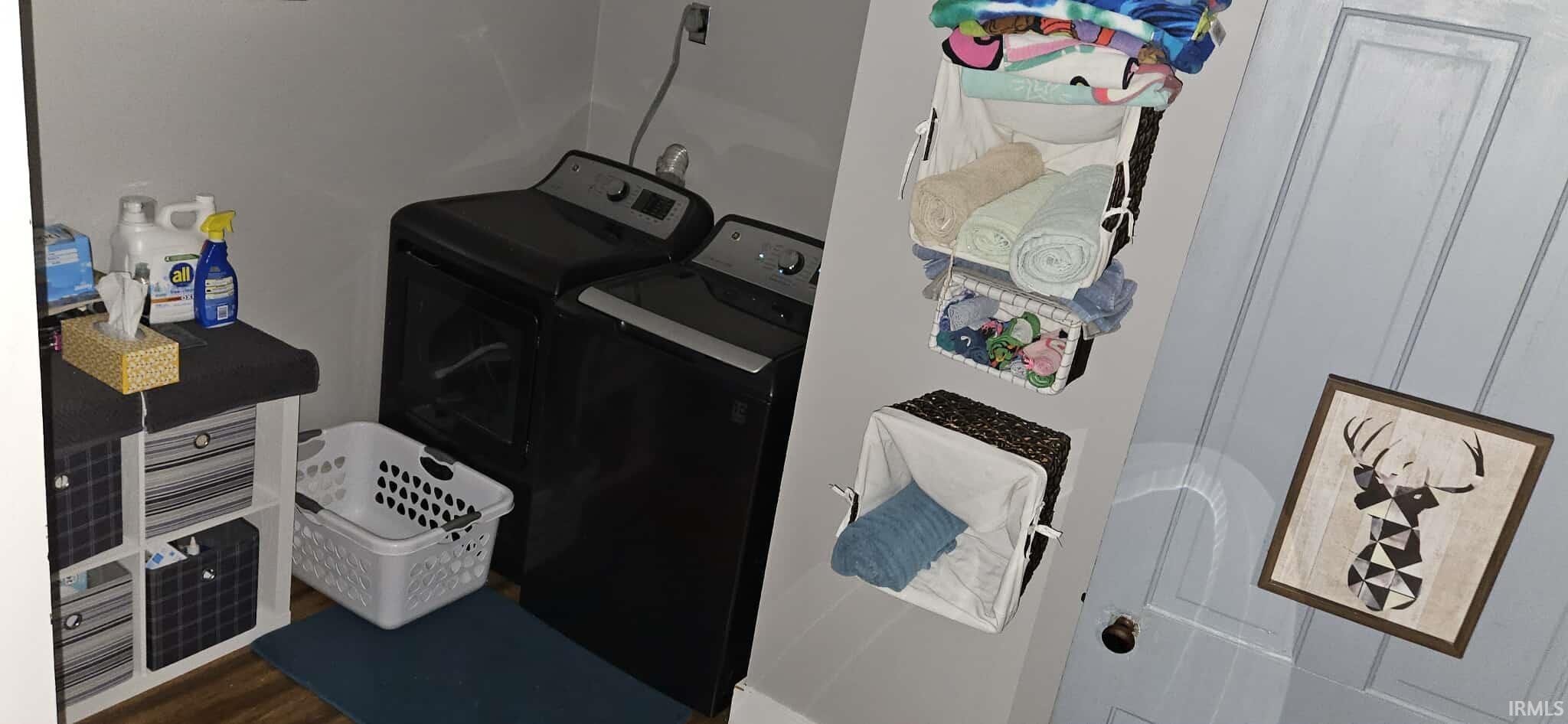 Washroom with washing machine and dryer