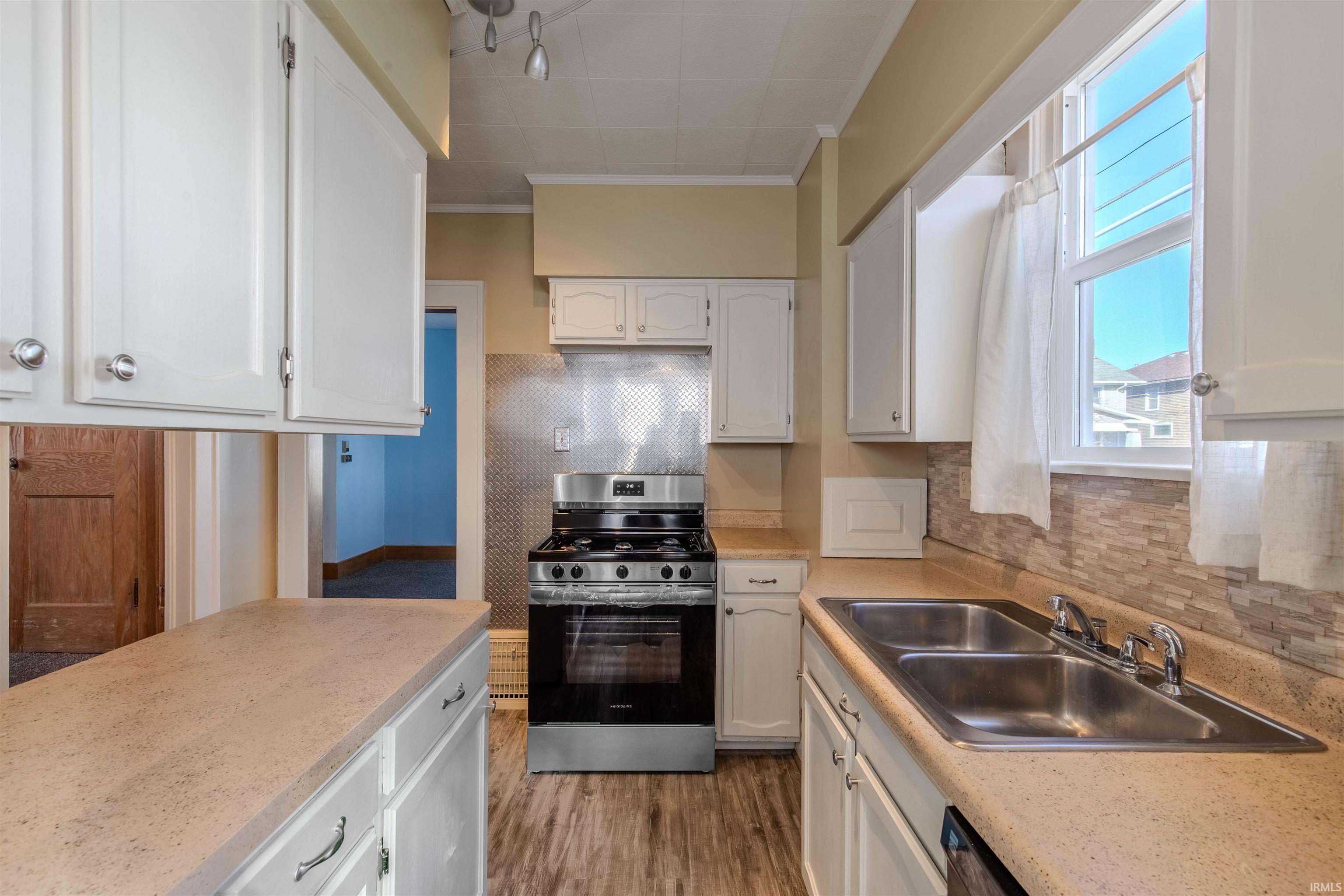 Renovated w/New backsplash & all New Appliances.