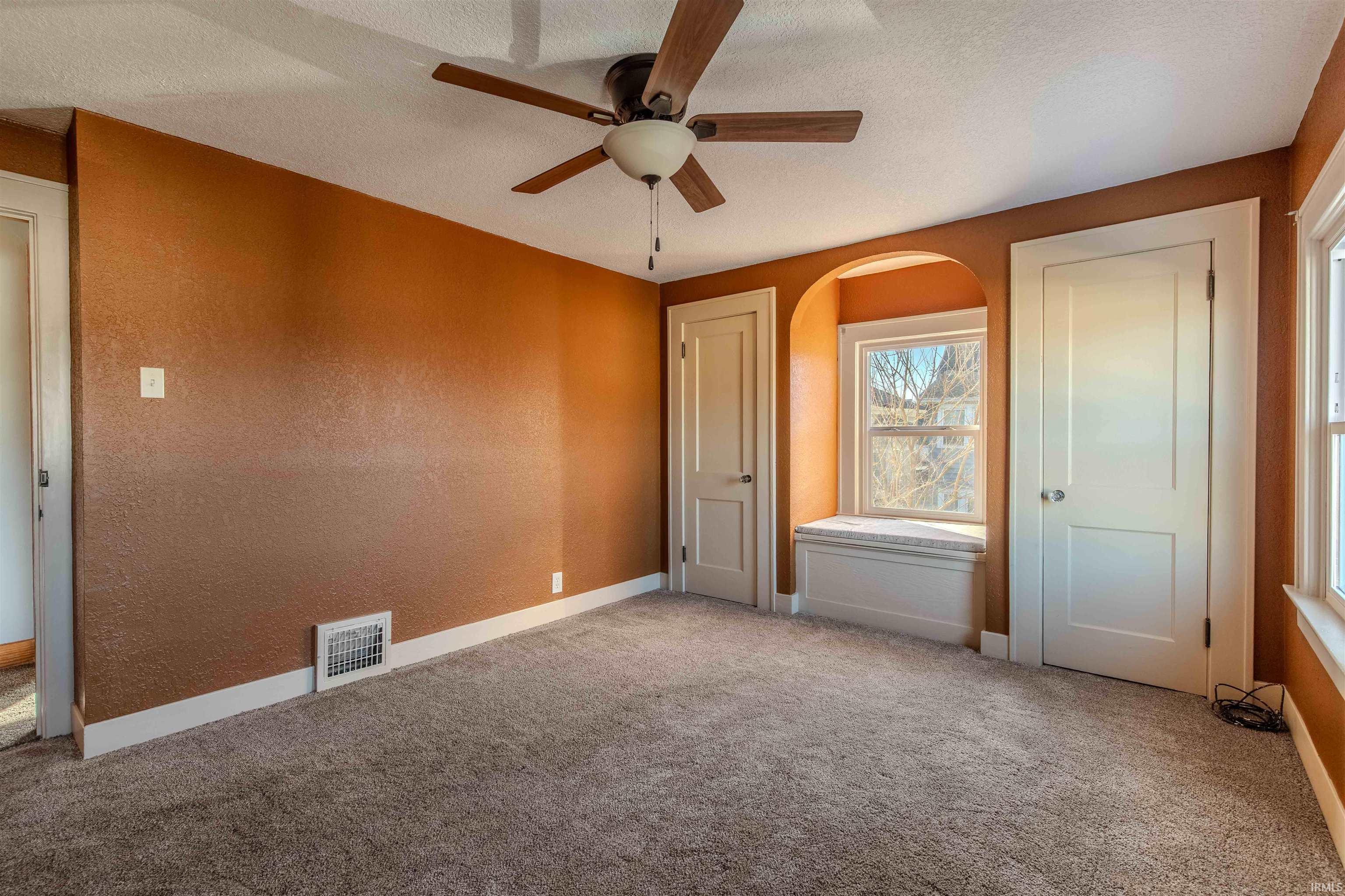 New Flooring, new paint & custom textured surfaces on ceiling & walls.