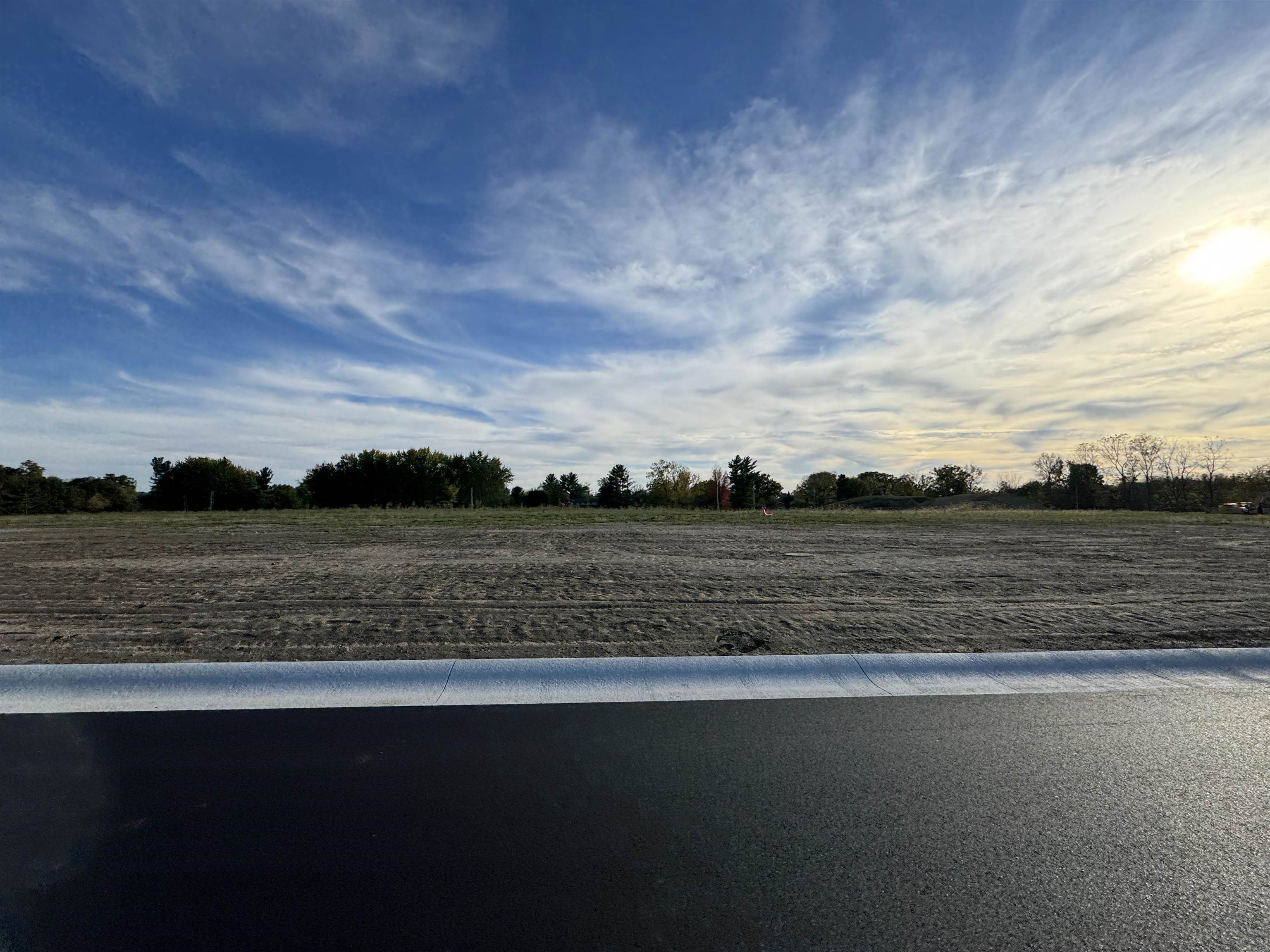 View of yard with a rural view