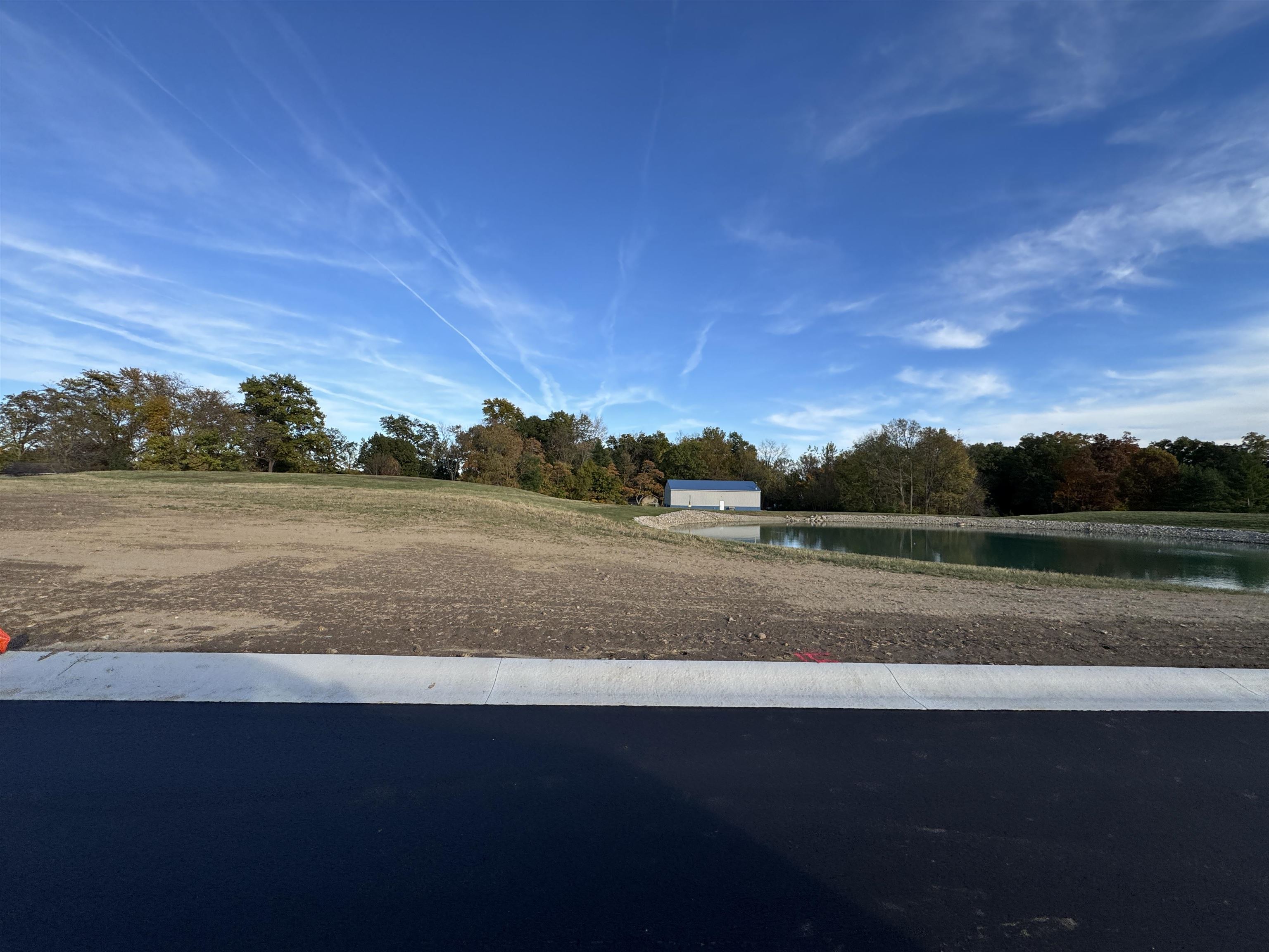 View of yard with a water view