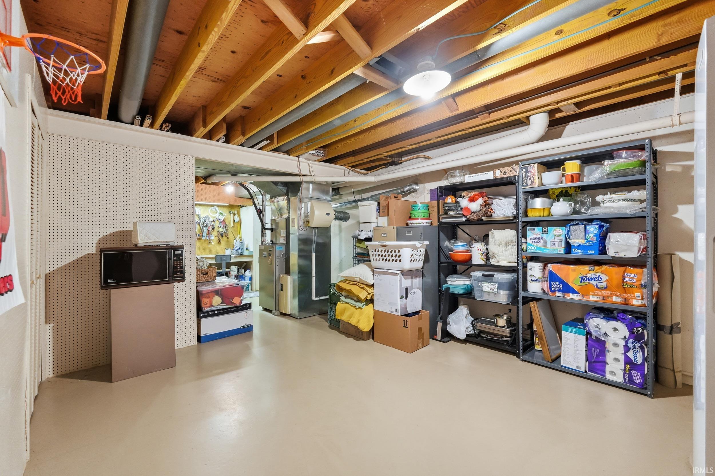 Unfinished basement with heating unit
