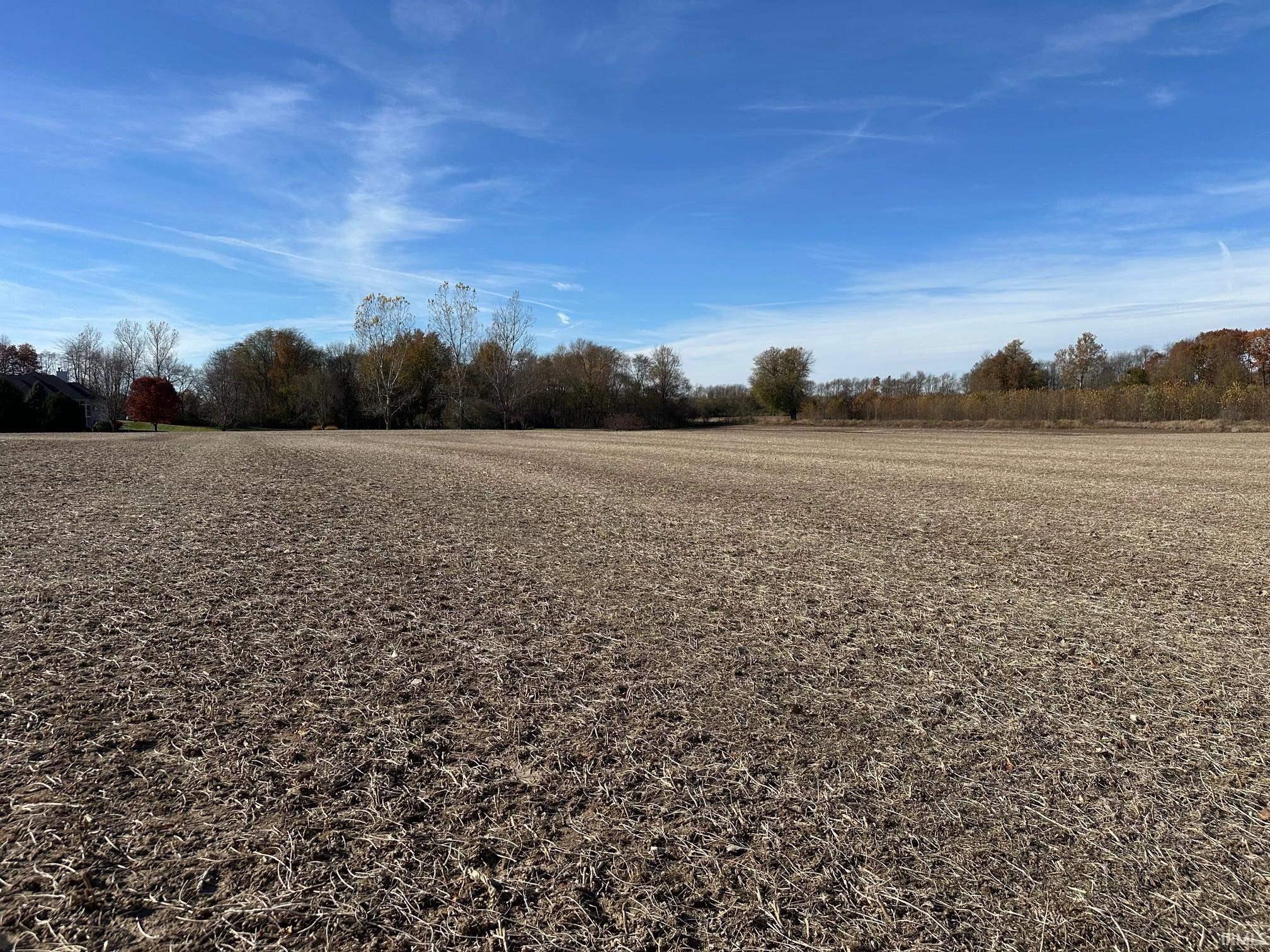 View of yard with a view of countryside