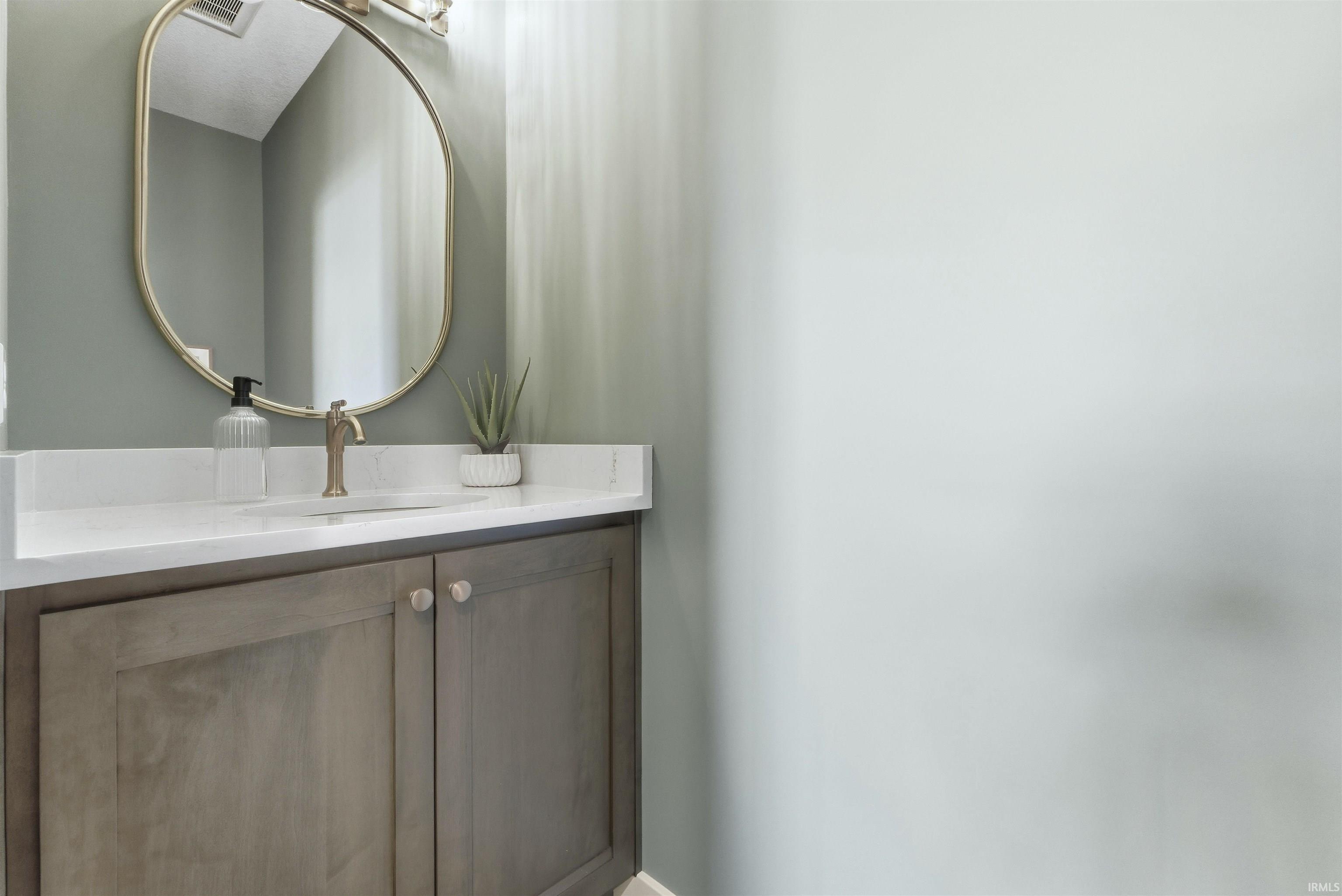 Bathroom featuring vanity