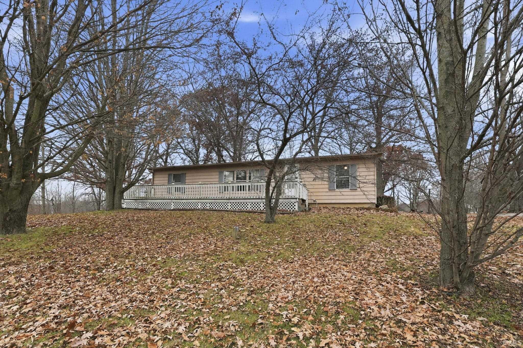 View of front of home with a deck