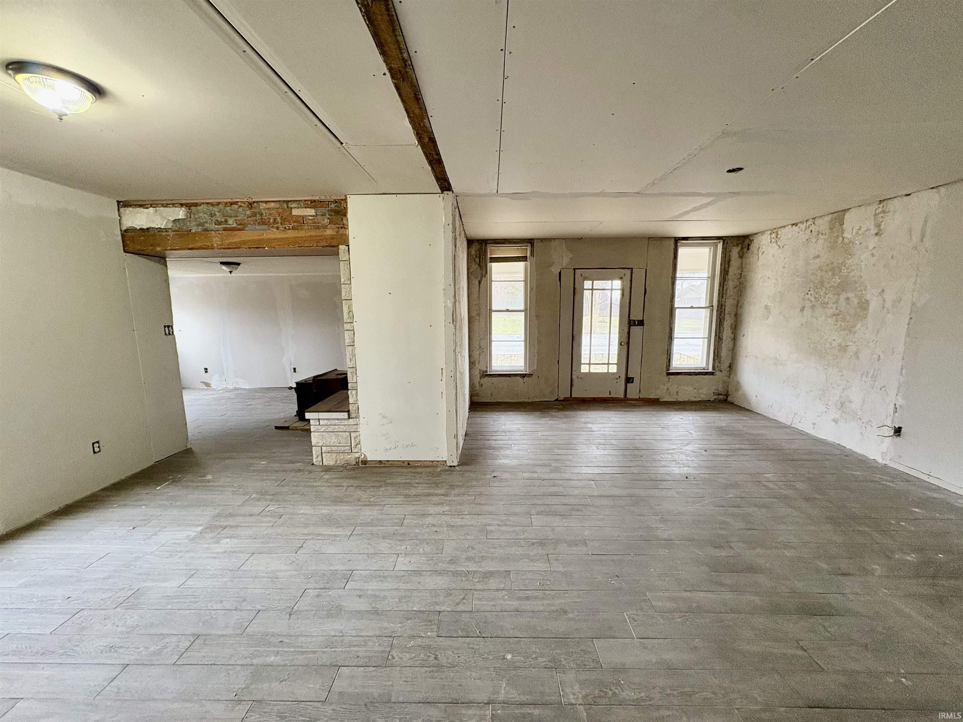 Unfurnished room featuring hardwood / wood-style floors