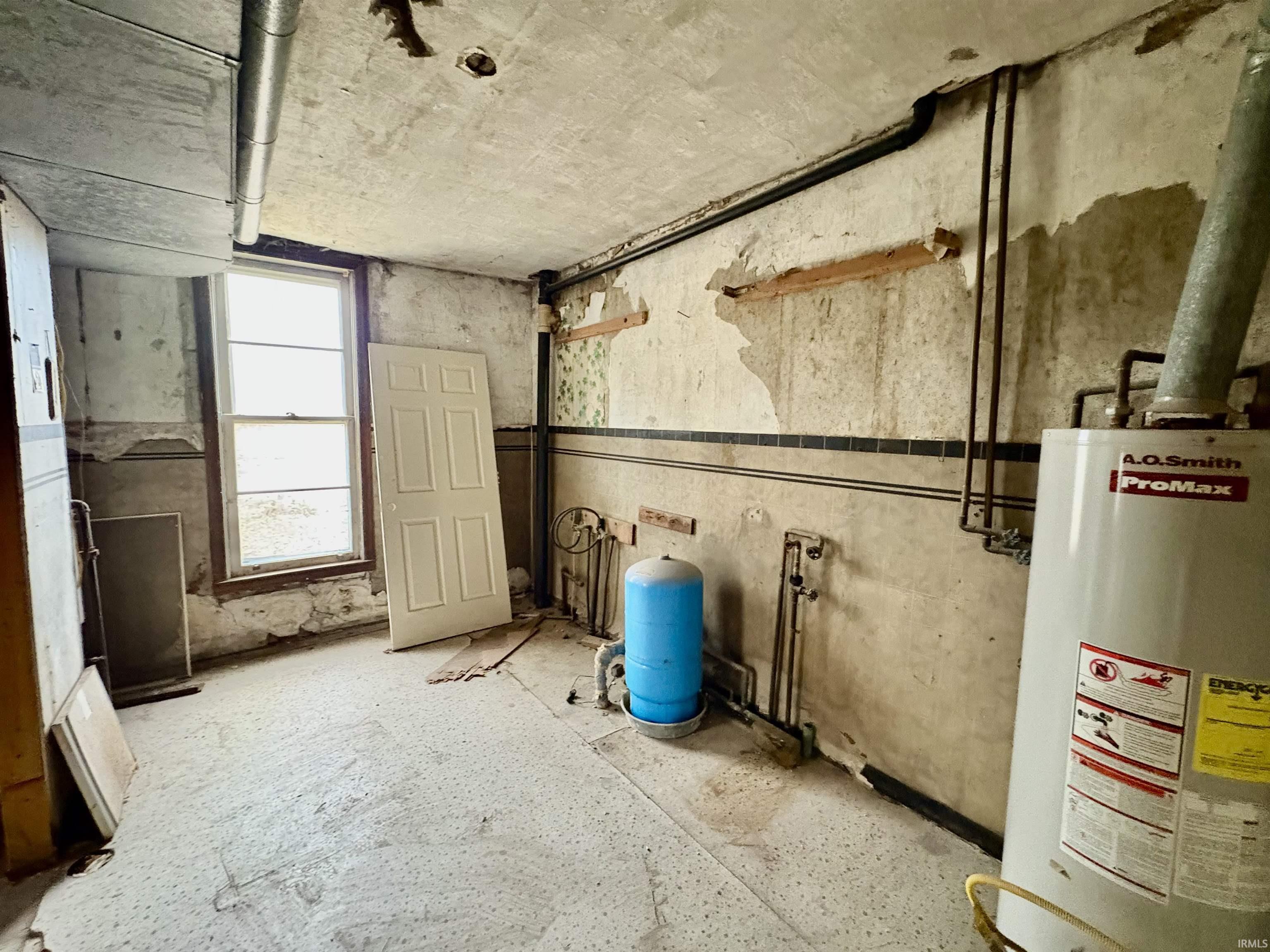 Utilities featuring gas water heater