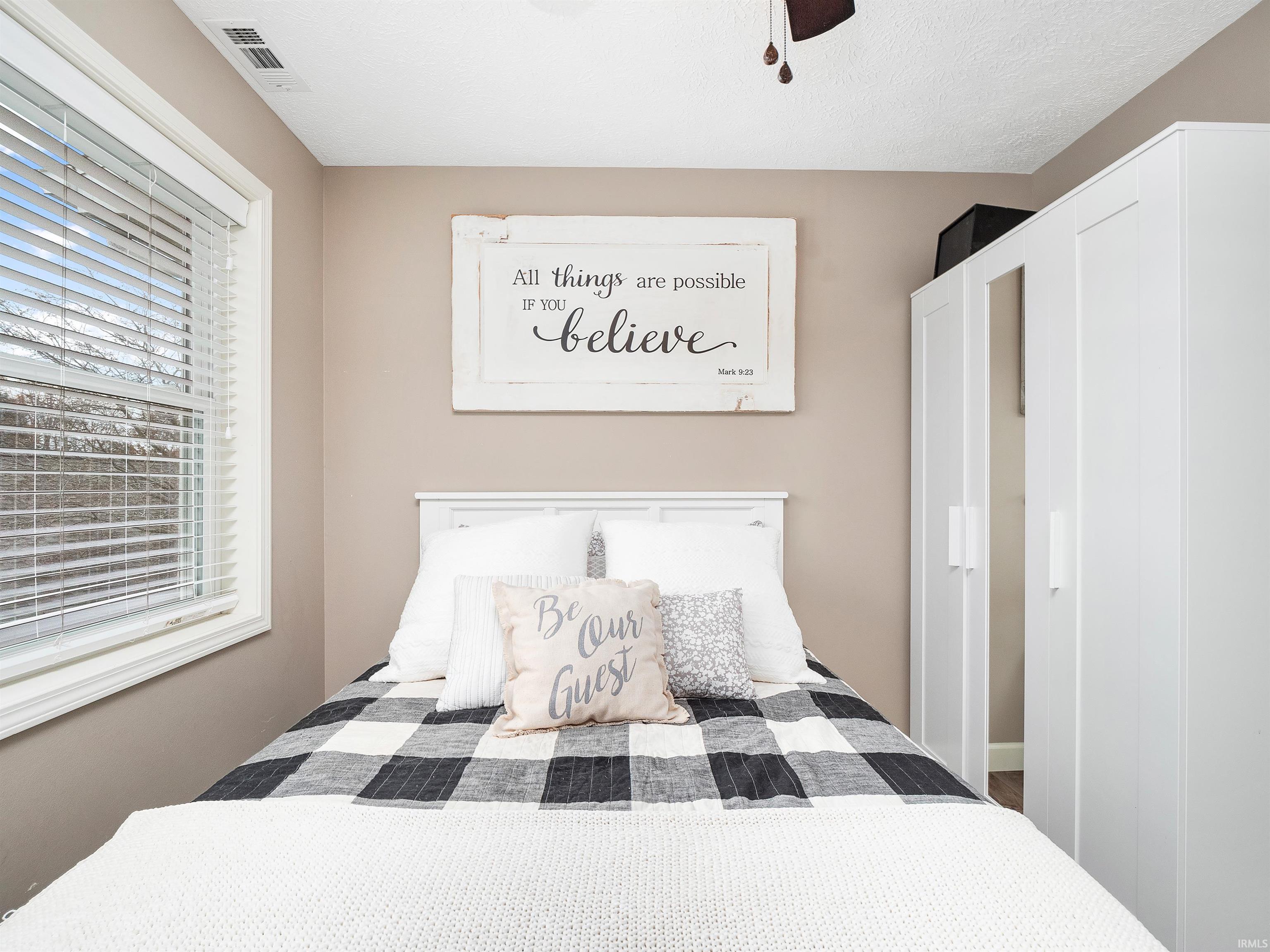 Bedroom with a ceiling fan