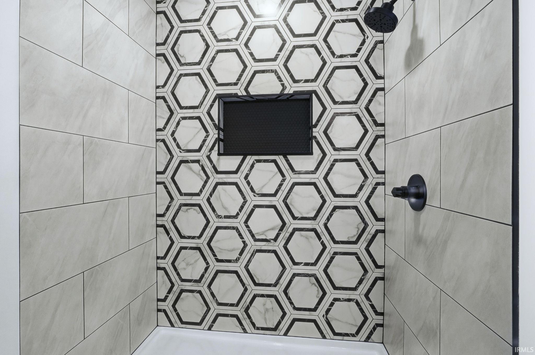 Bathroom featuring tiled shower