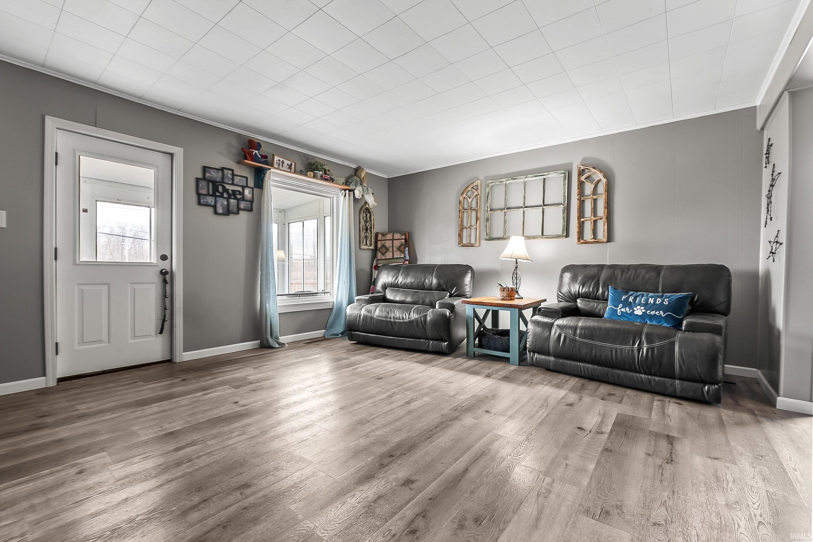 Living area with wood finished floors