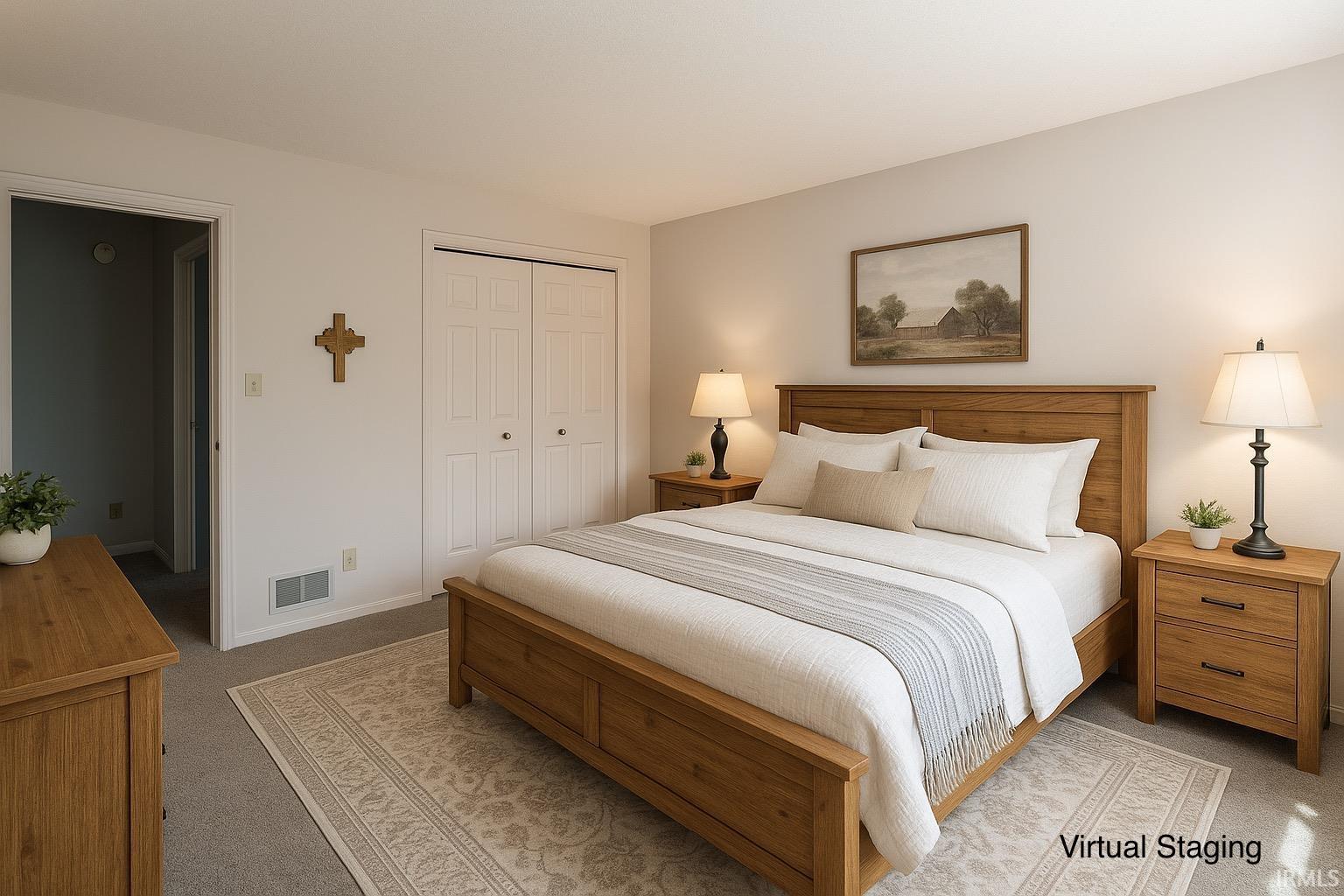 Carpeted bedroom with a closet and baseboards