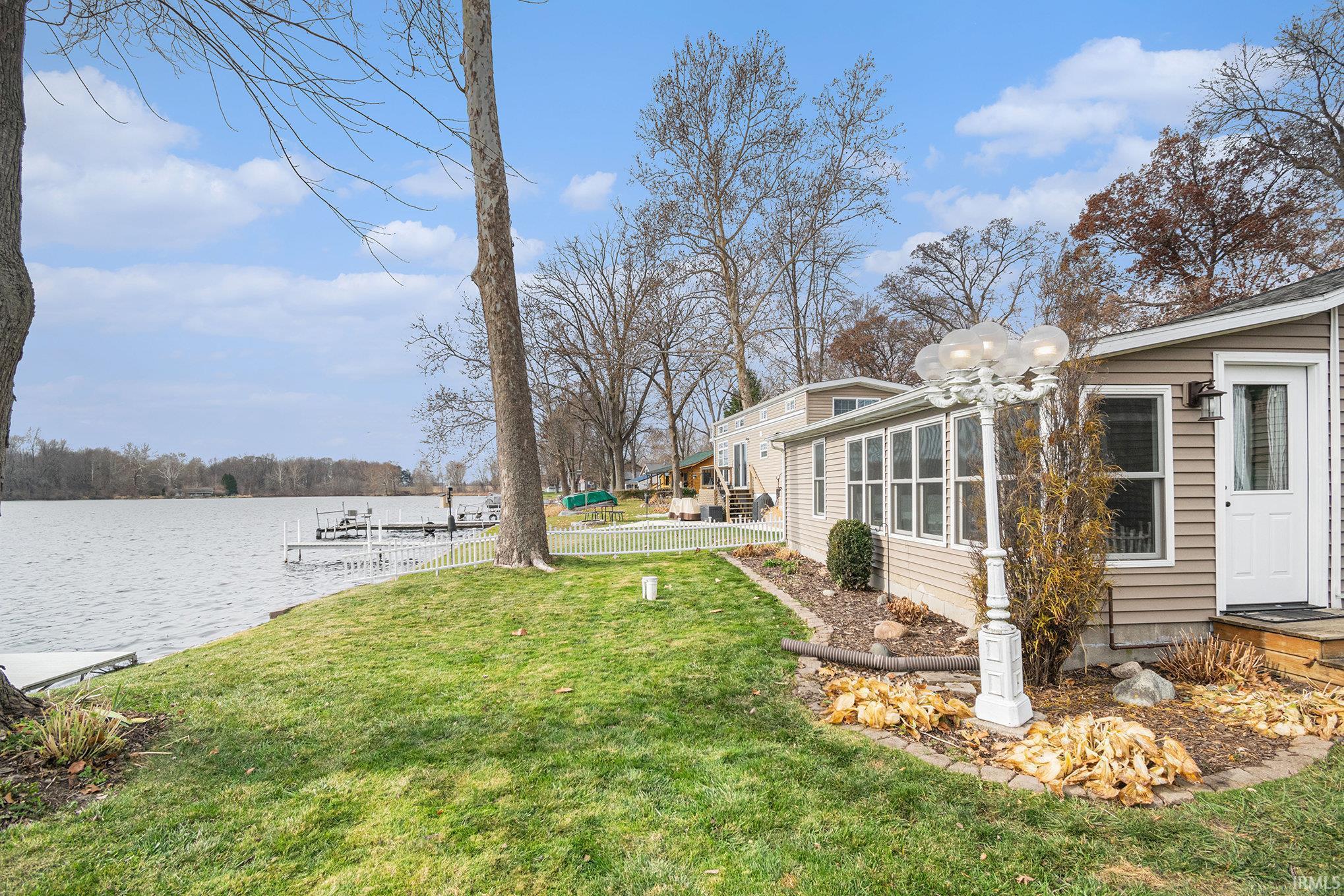 View of yard with a water view