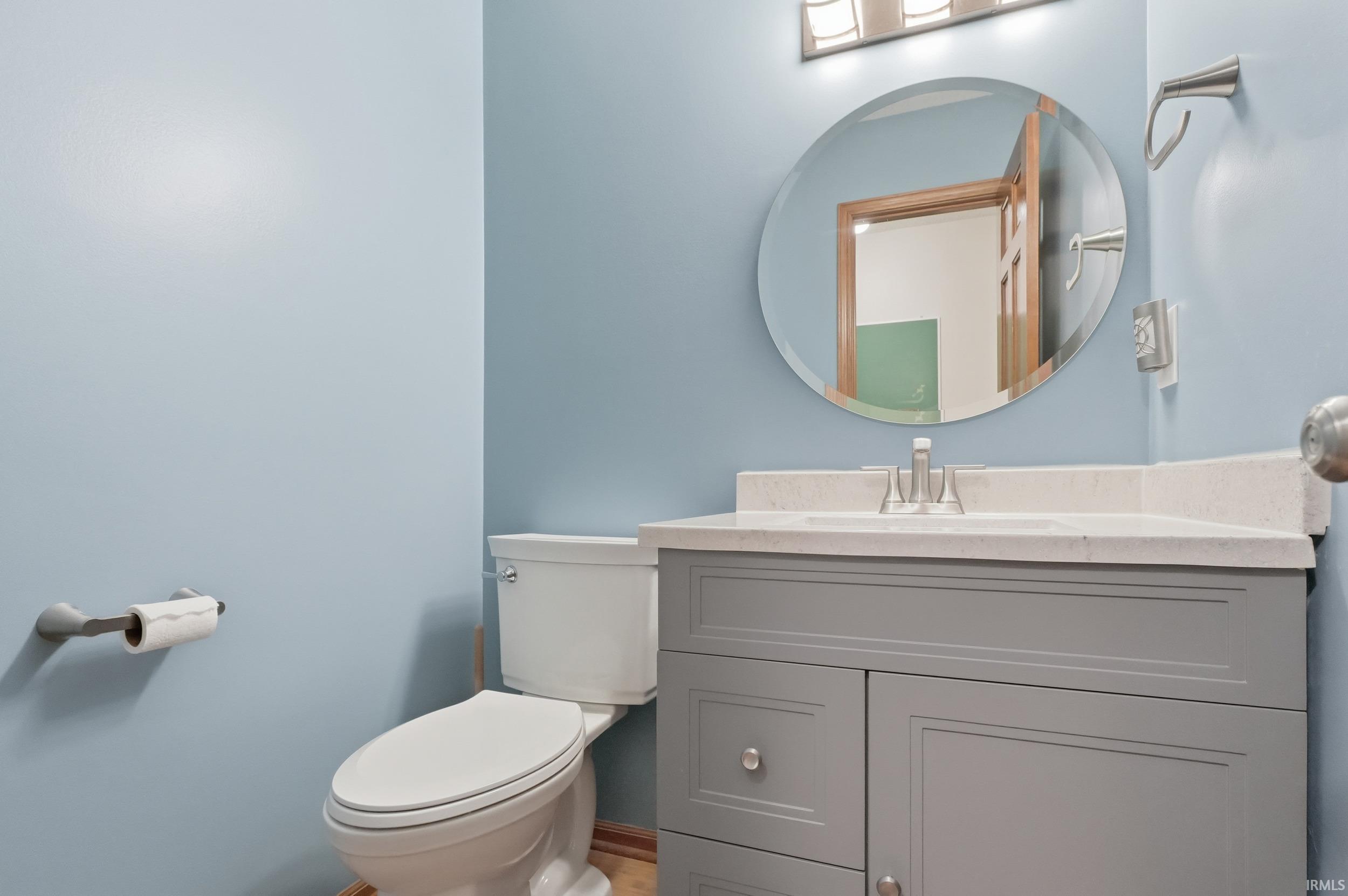 Bathroom with vanity and toilet
