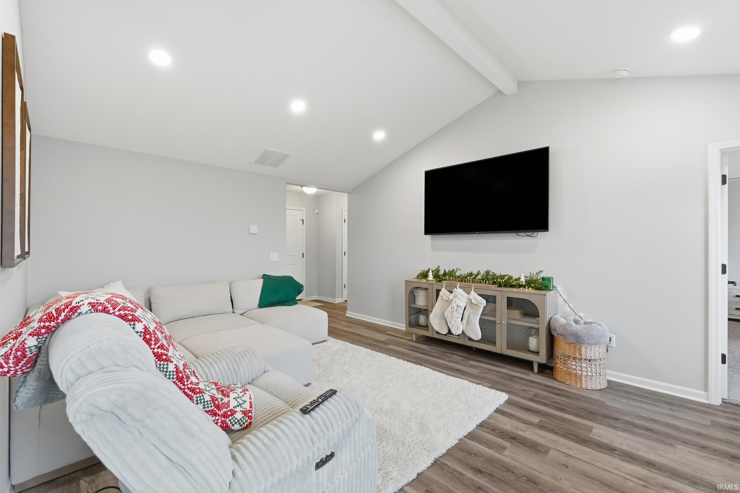Living room featuring recessed lighting and wood finished floors