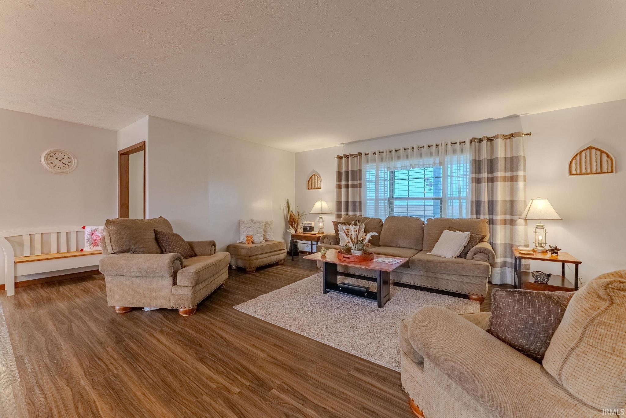 Living room featuring wood finished floors