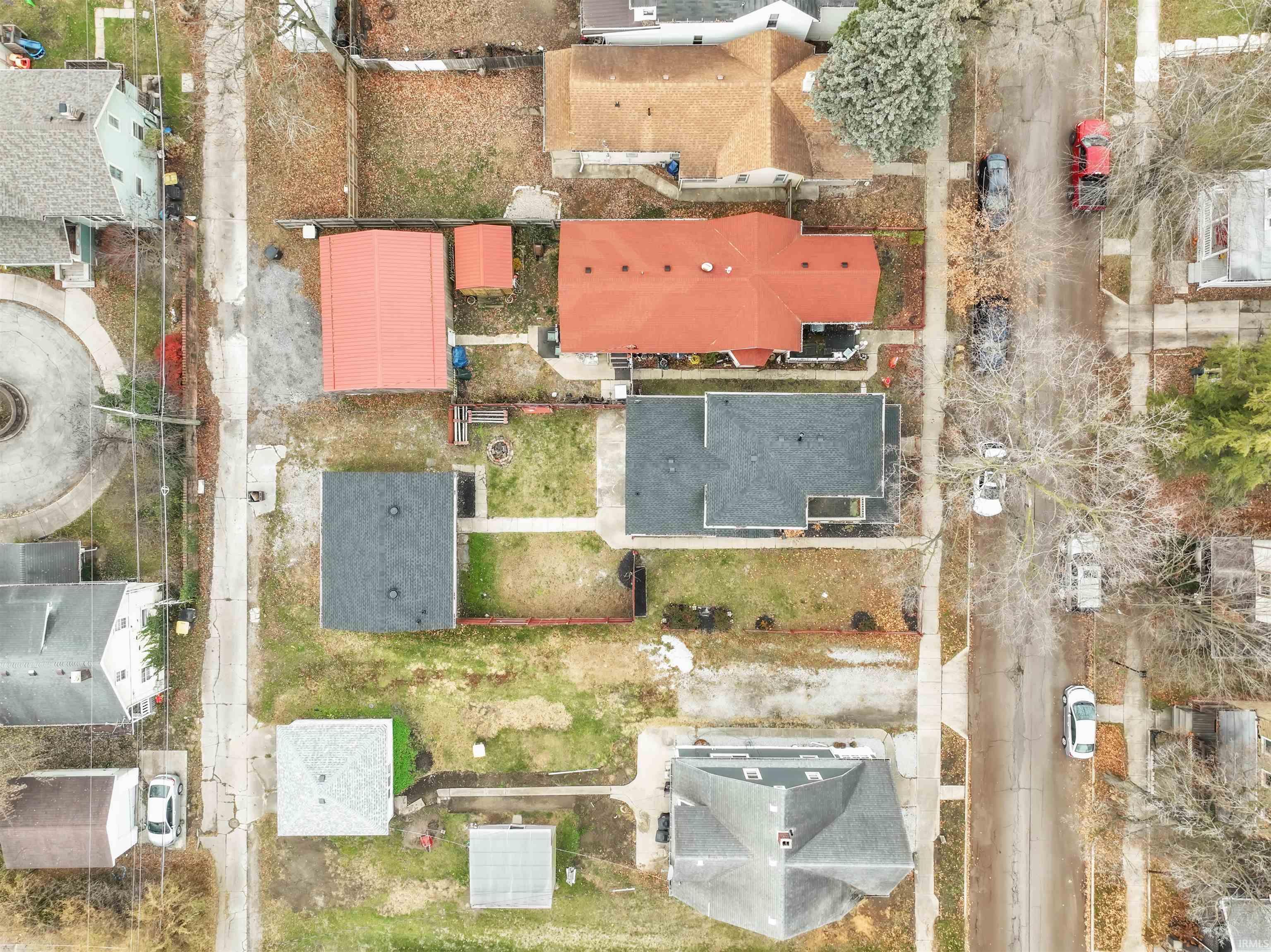 Aerial overview of property's location with nearby suburban area