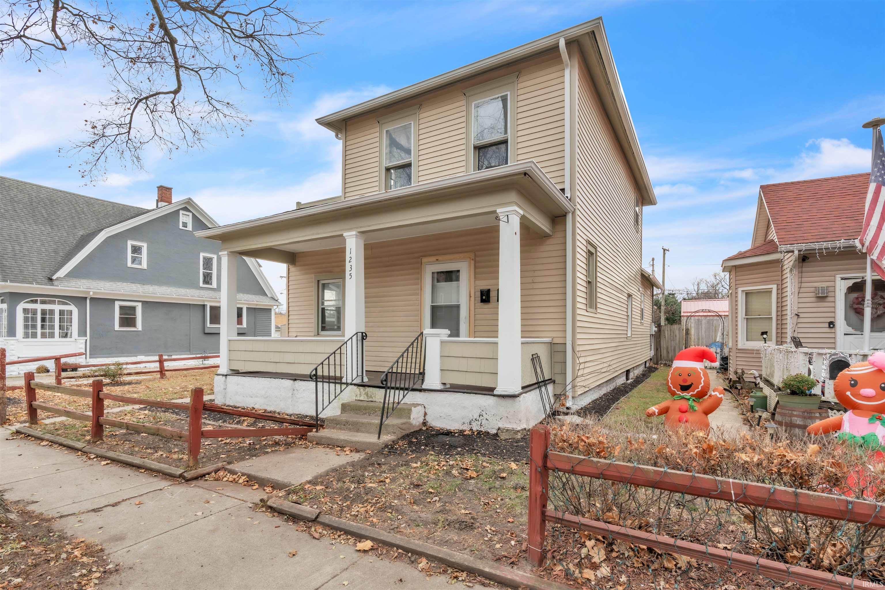 View of front of property with covered porch