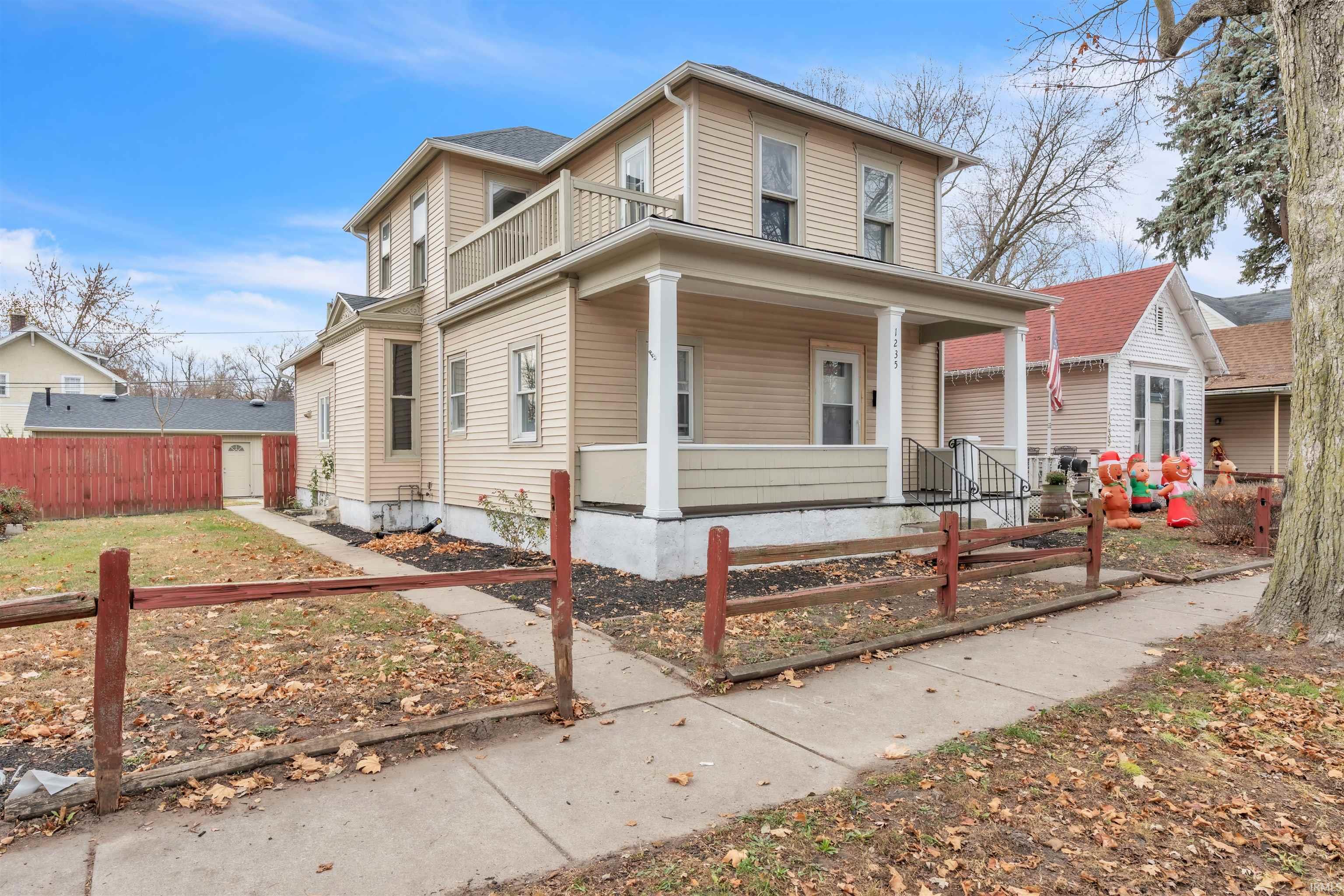 View of front of property with a porch