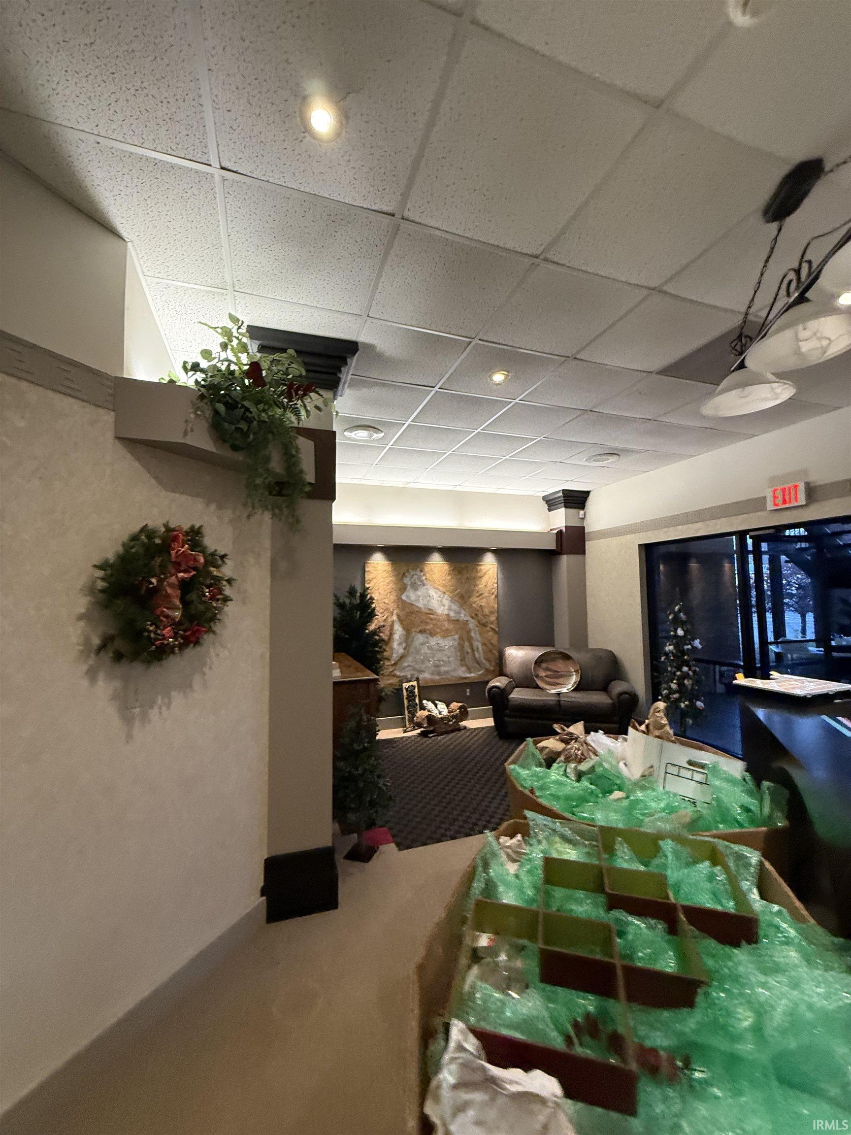 Building lobby featuring a paneled ceiling