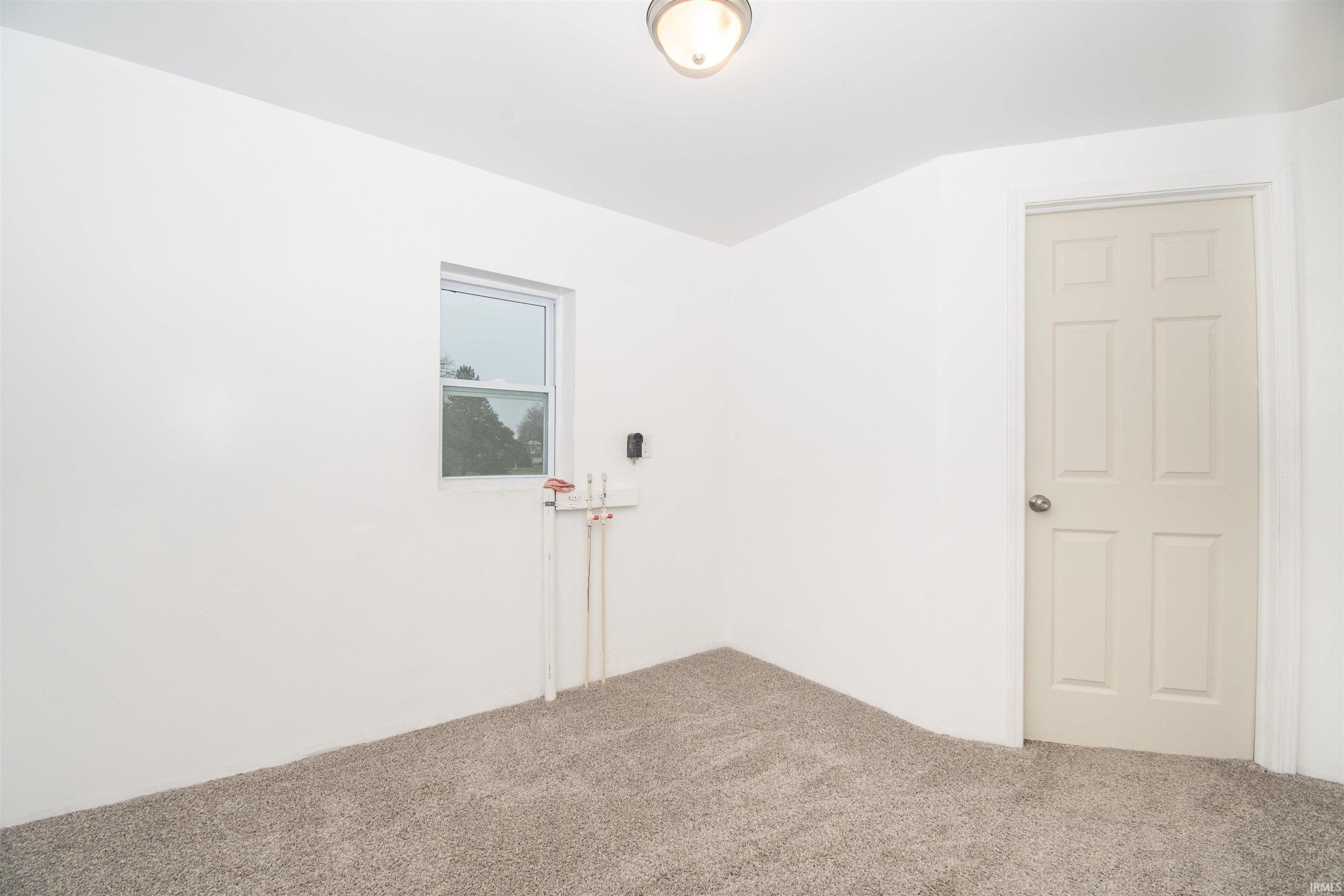 Spare room with carpet