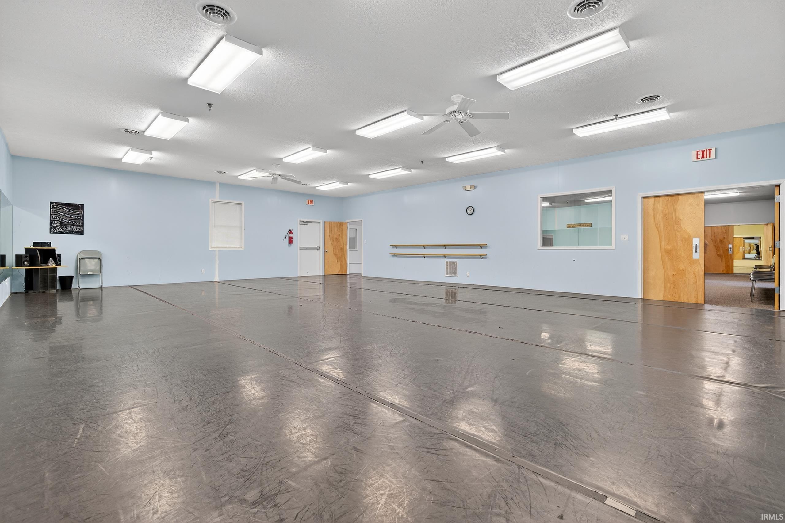 Garage featuring a ceiling fan