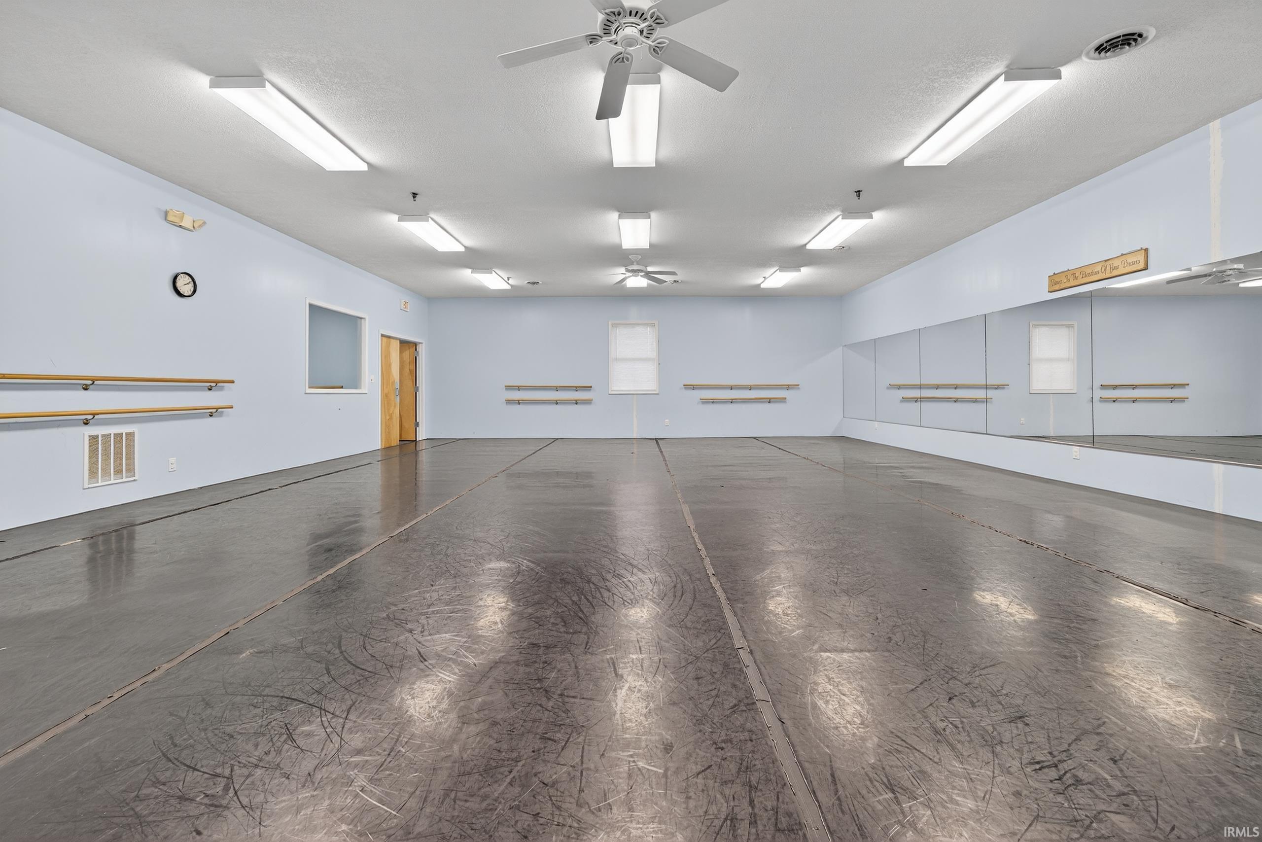 Garage featuring ceiling fan