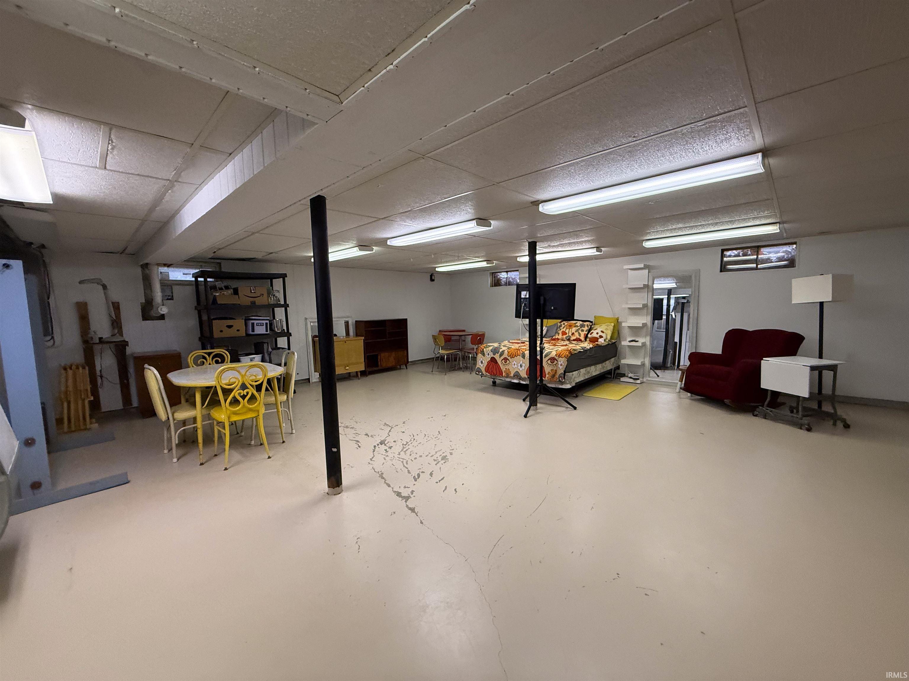 Finished basement with a drop ceiling