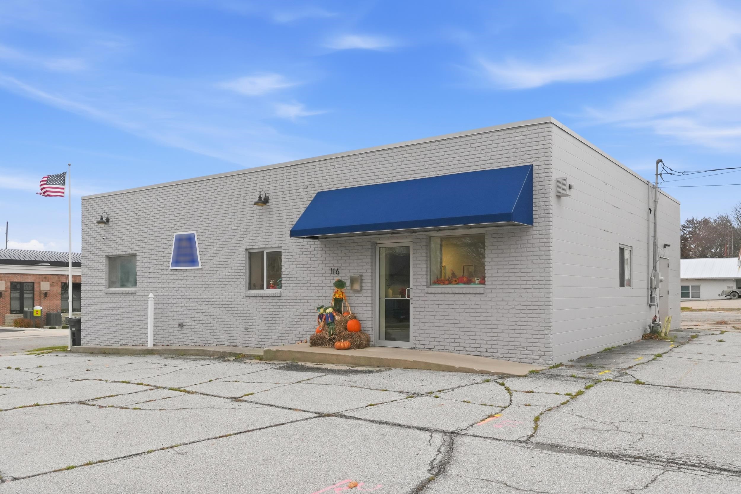 Back of property with brick siding