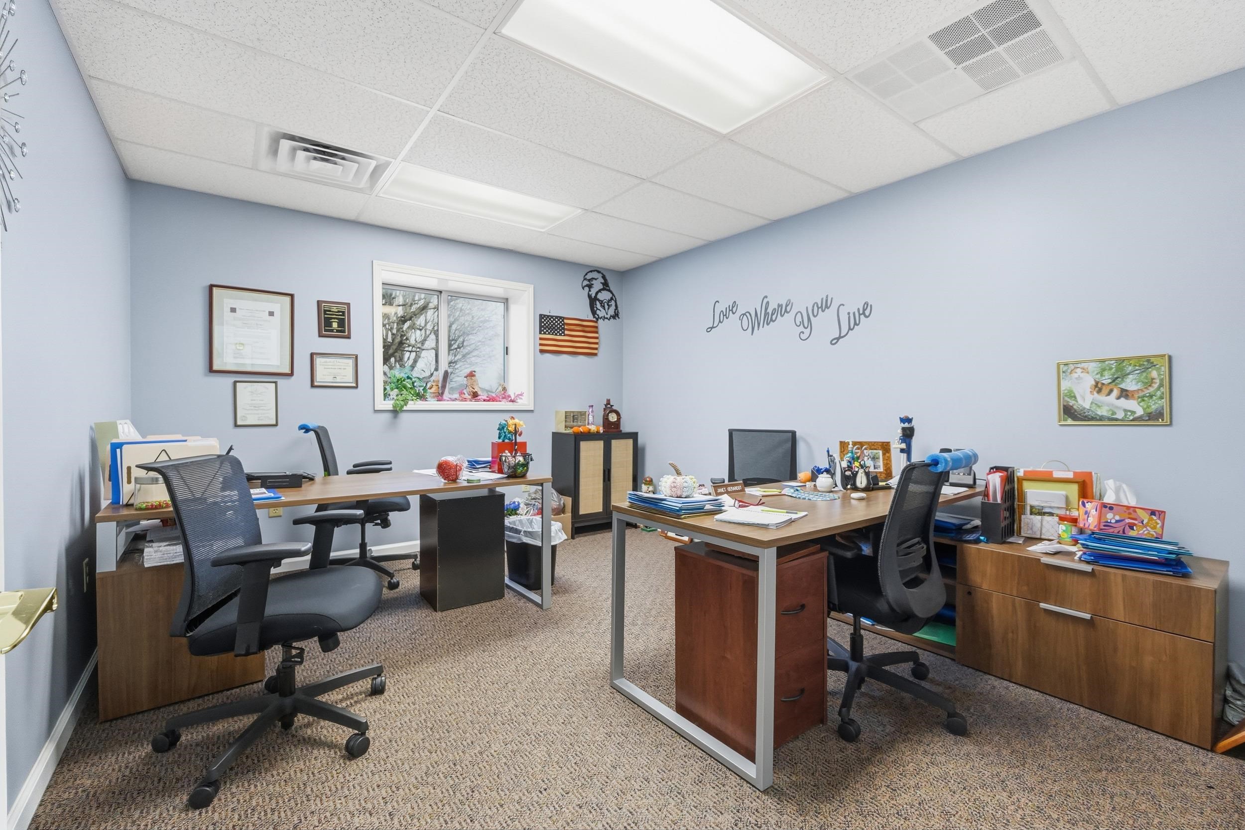 Office featuring a drop ceiling