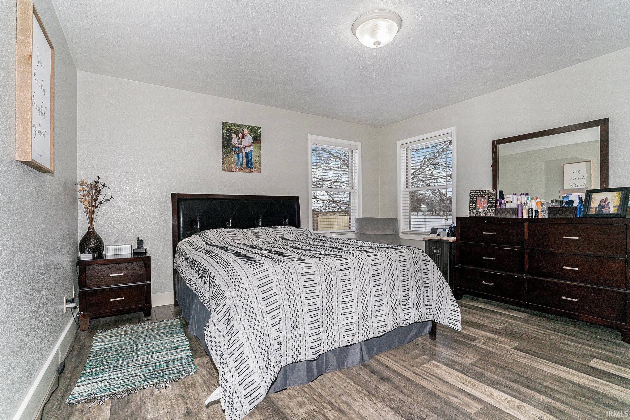 Bedroom featuring wood finished floors
