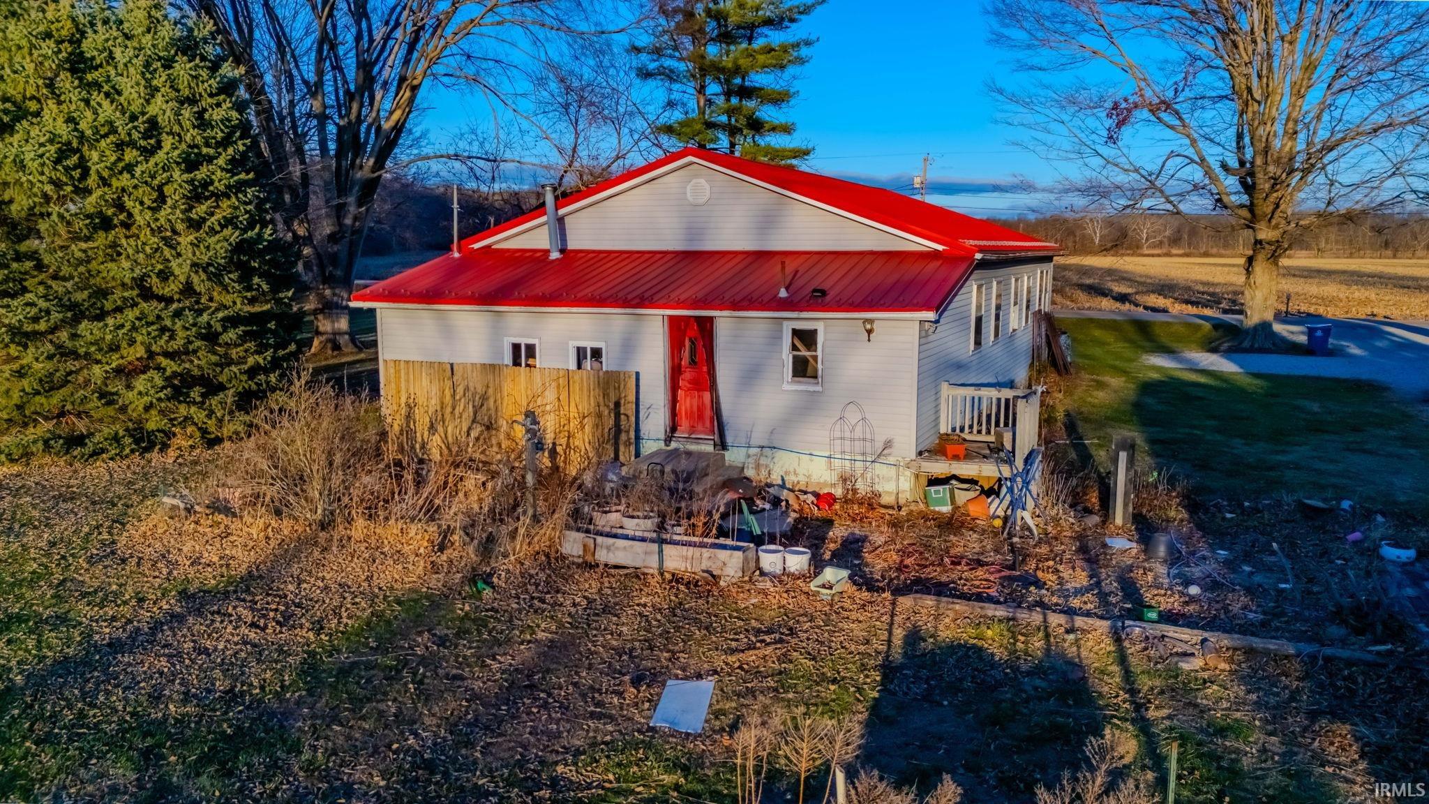 View of front of home featuring a metal roof