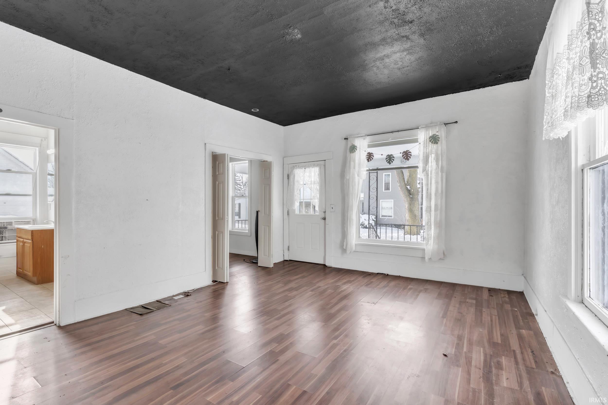 Foyer with wood finished floors