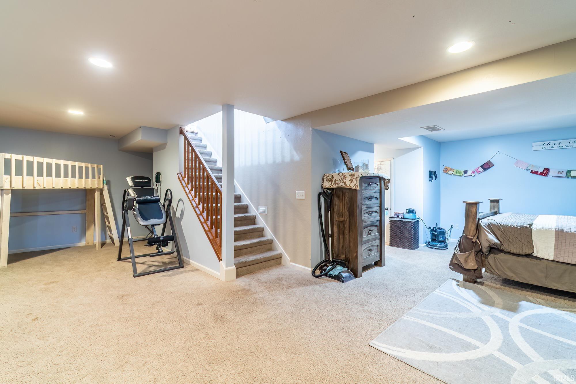 Bedroom featuring carpet and recessed lighting