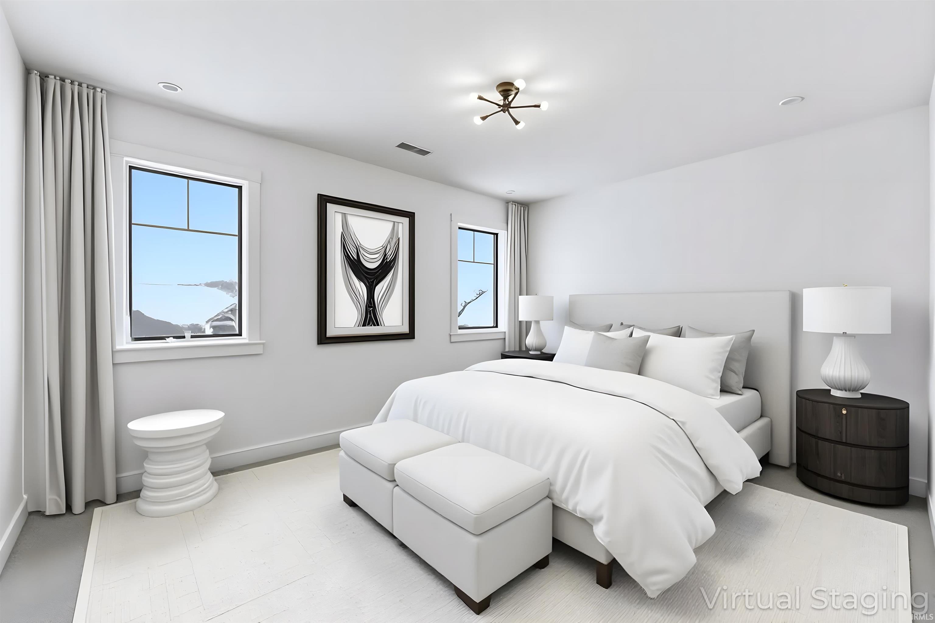 Bedroom featuring multiple windows