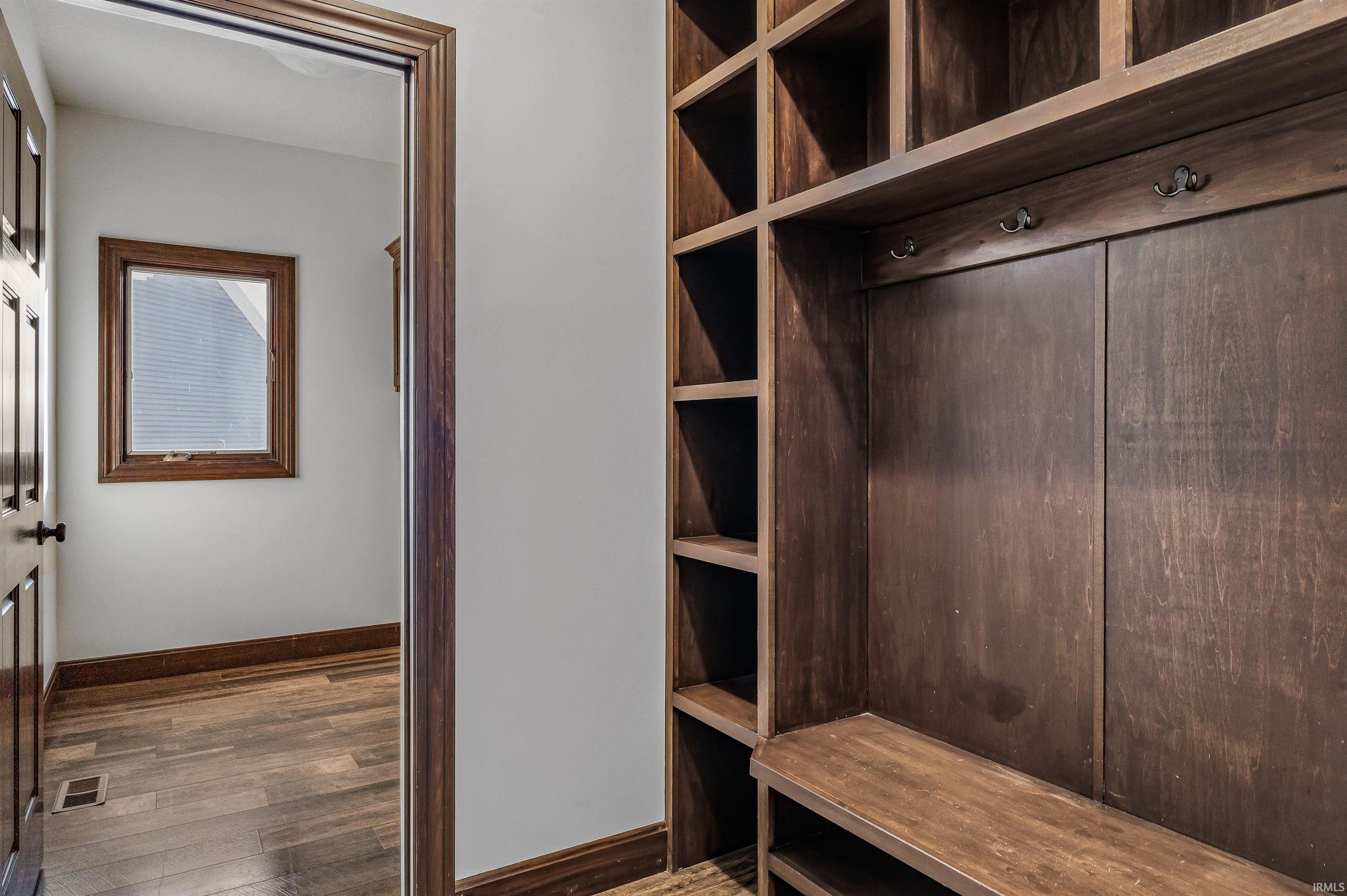 Mudroom featuring wood finished floors