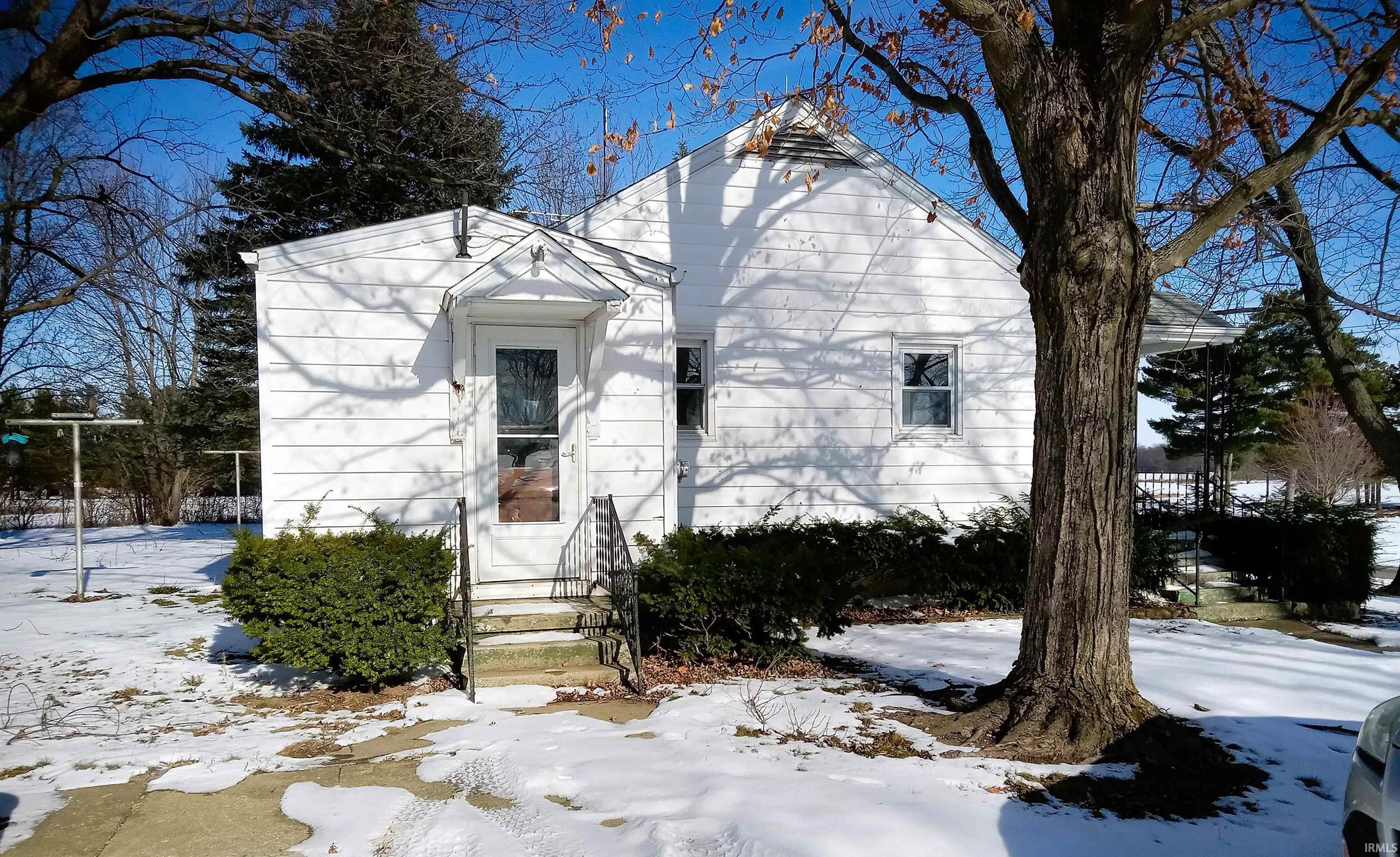 View of front of house featuring entry steps