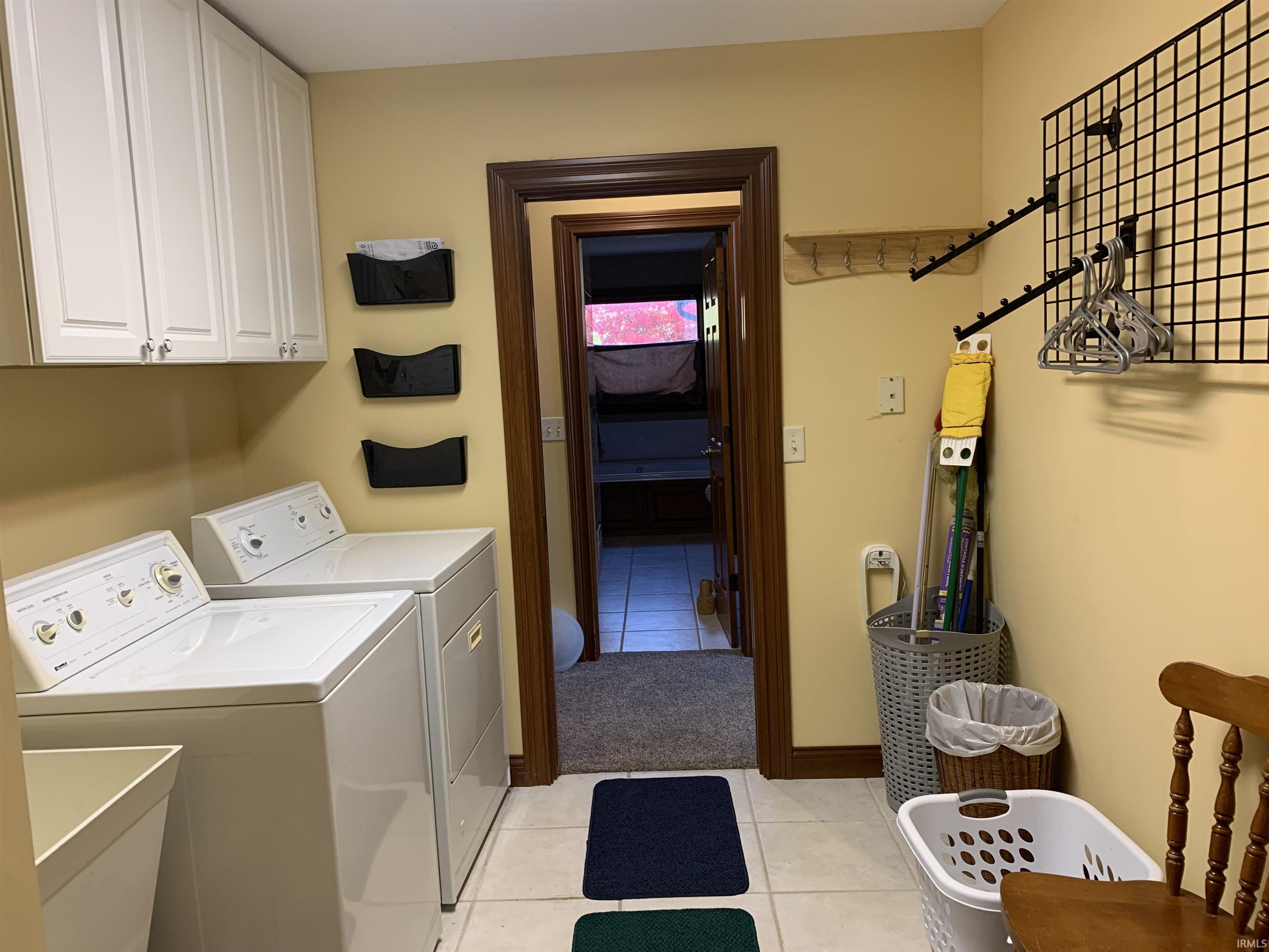 Mud room.  Extra Large Storage closets.  Wet sink.  Pocket Door to Hallway.  Washer & Dryer Stays.