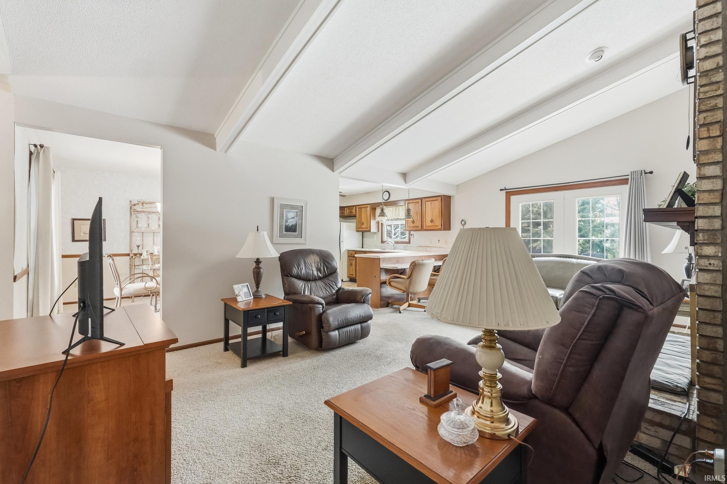 Living room with light carpet
