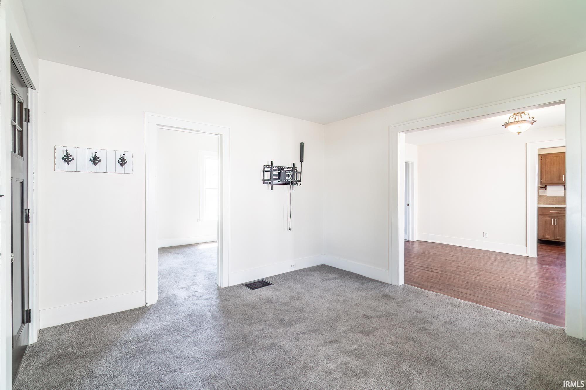 Spare room with carpet flooring