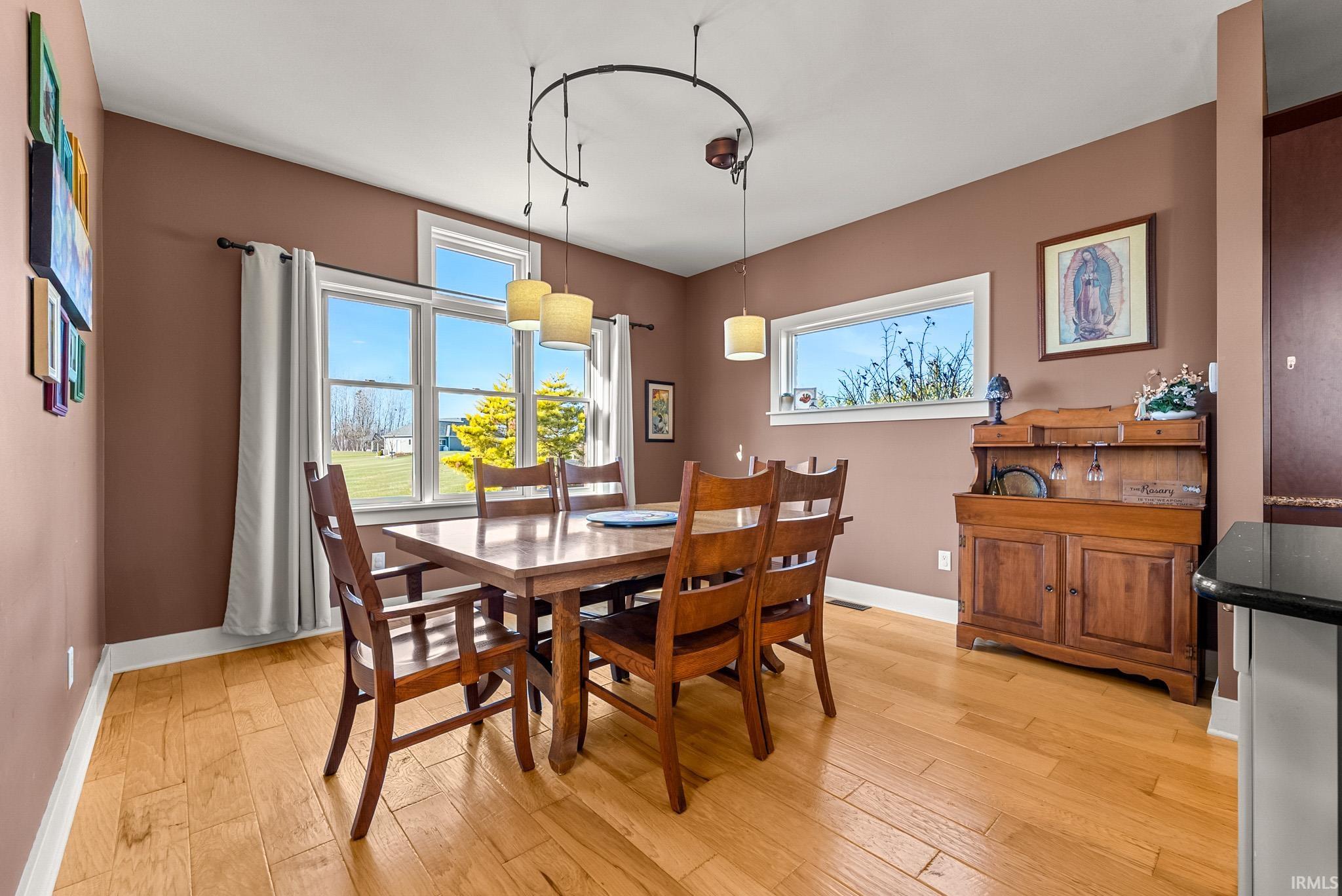 Dining room featuring light wood finished floors