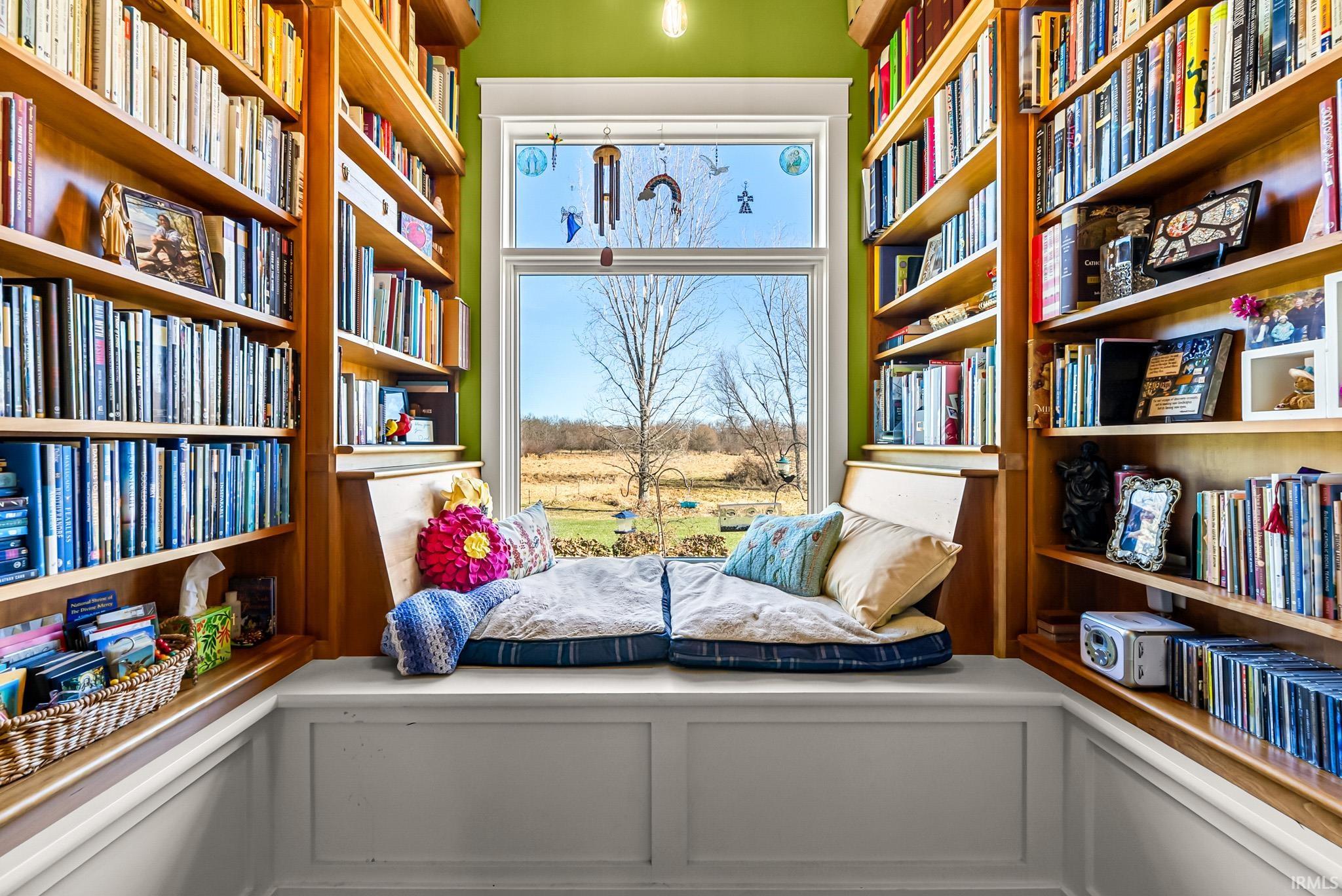 Sitting room with wall of books
