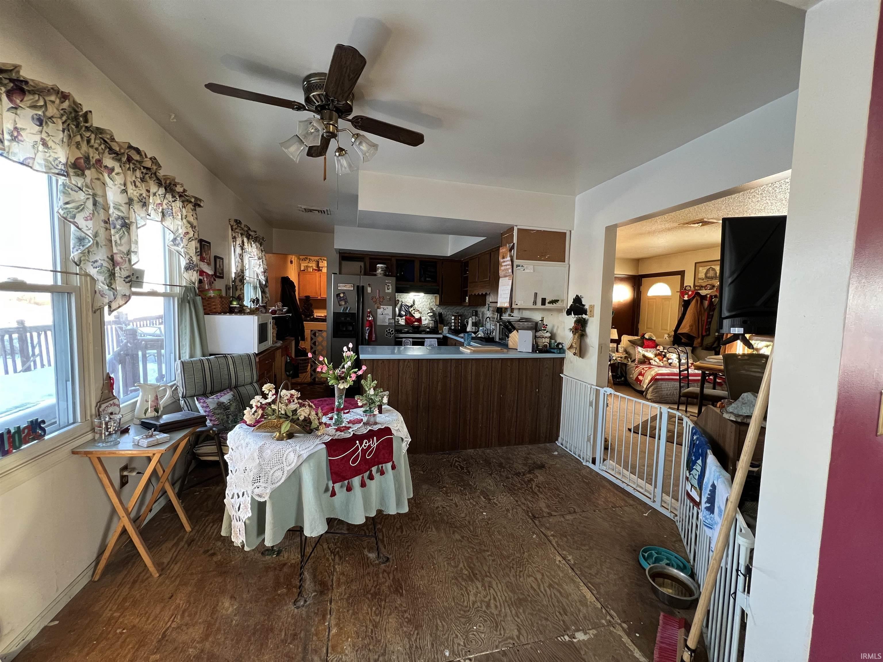Dining area with a ceiling fan