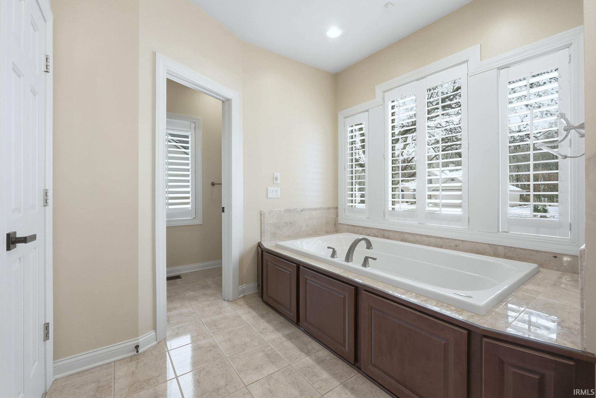 Garden Tub with Plantation shutters for privacy