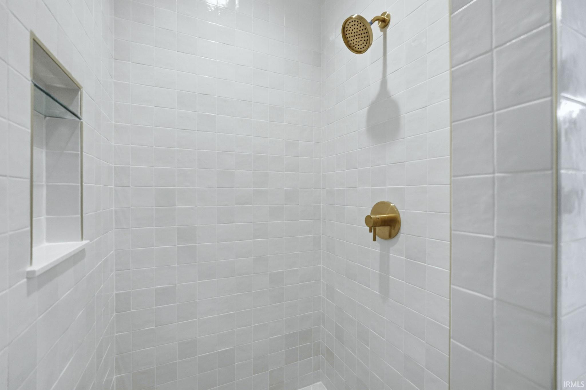 Bathroom with a tile shower