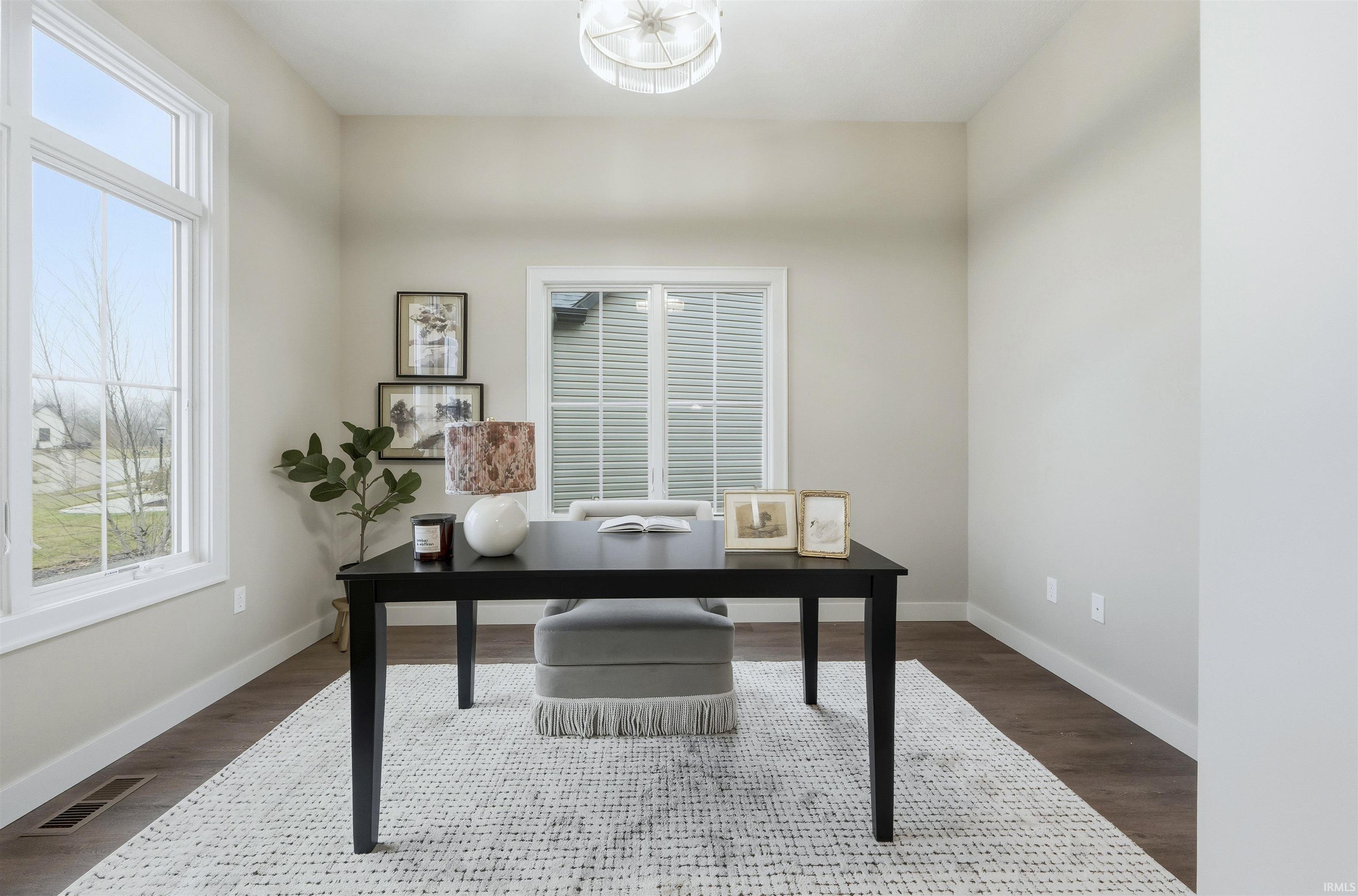 Home office featuring wood finished floors