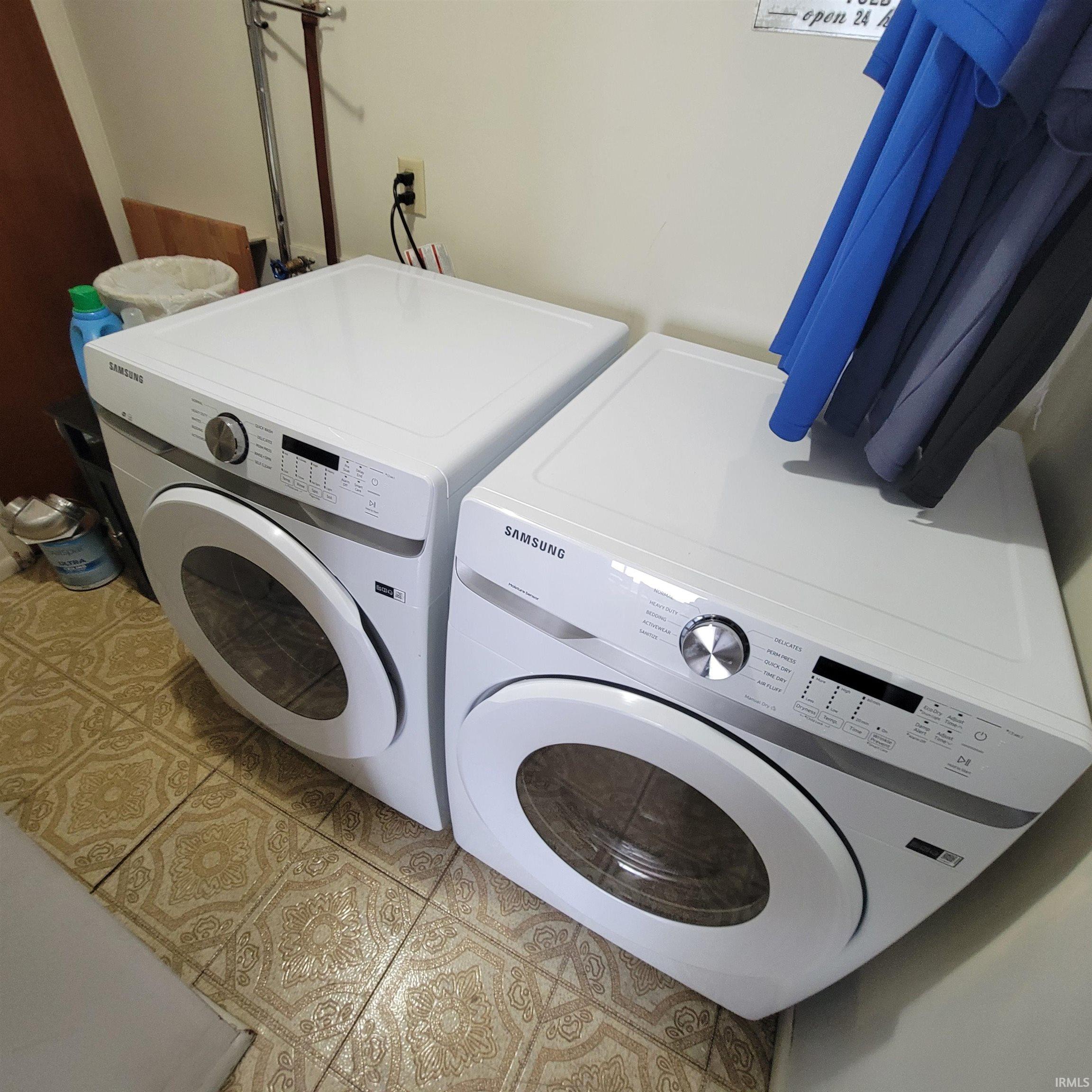 Laundry room with washing machine and dryer
