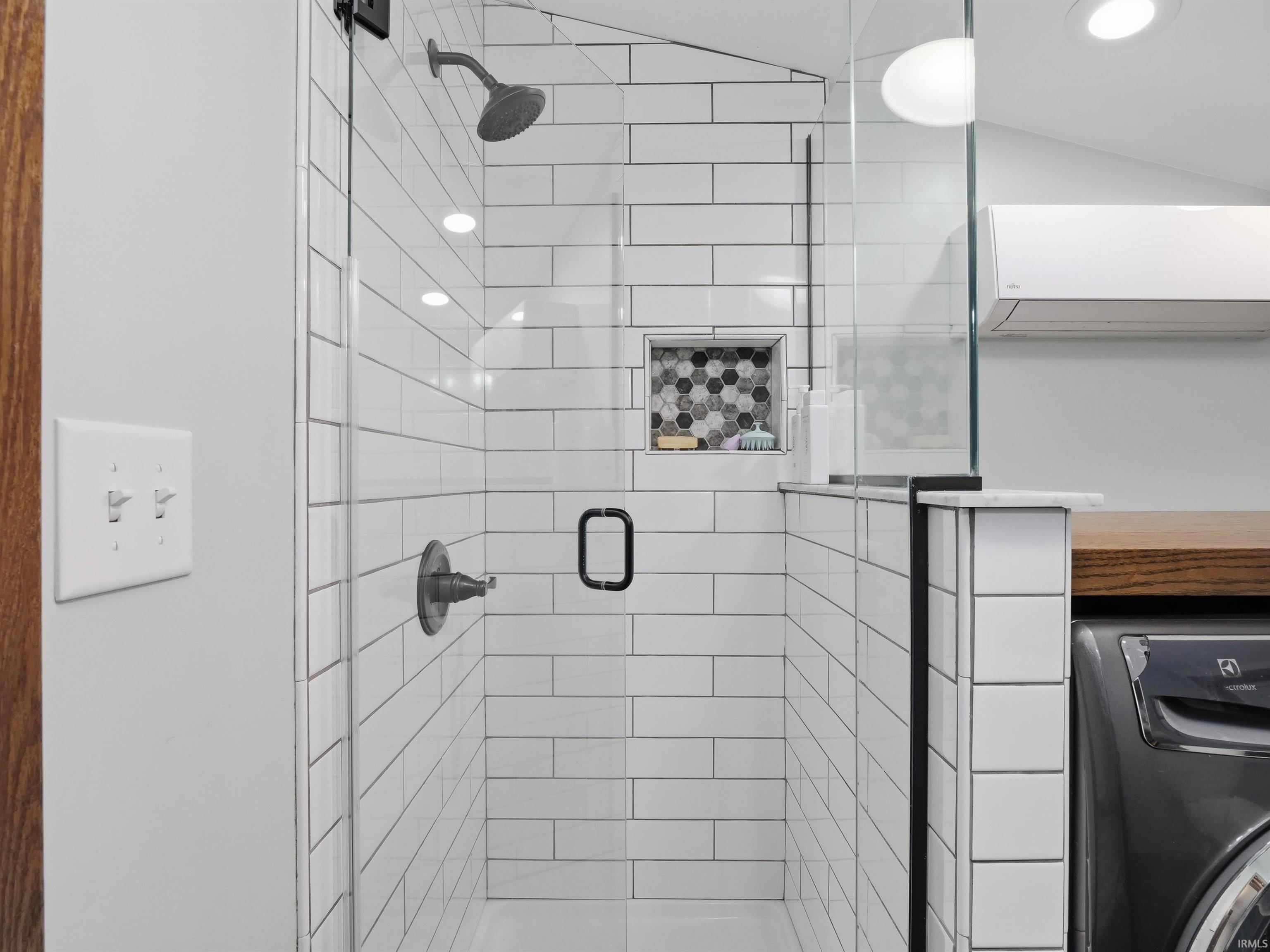Subway tile walk-in shower.