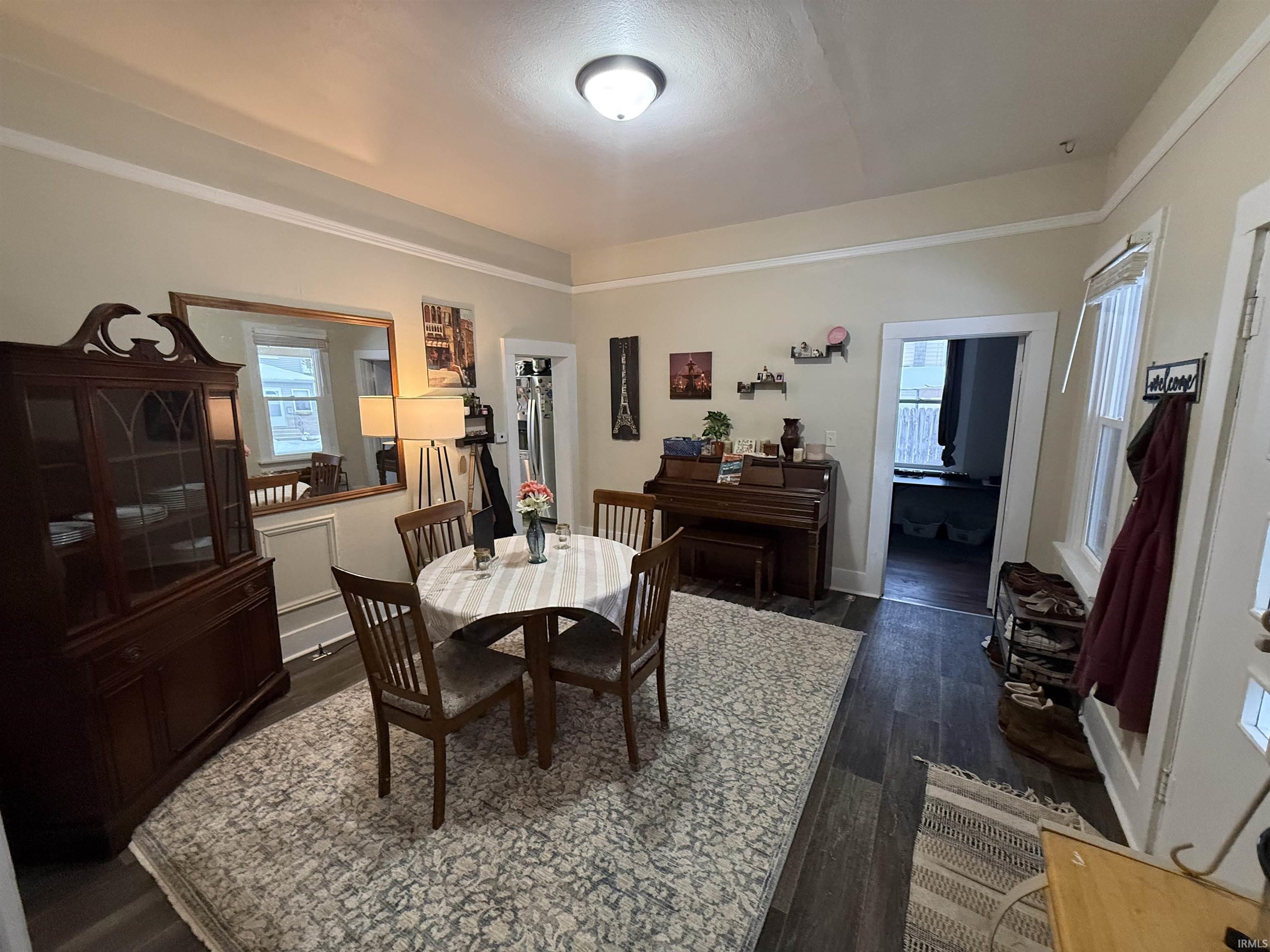 Dining room featuring dark wood finished floors