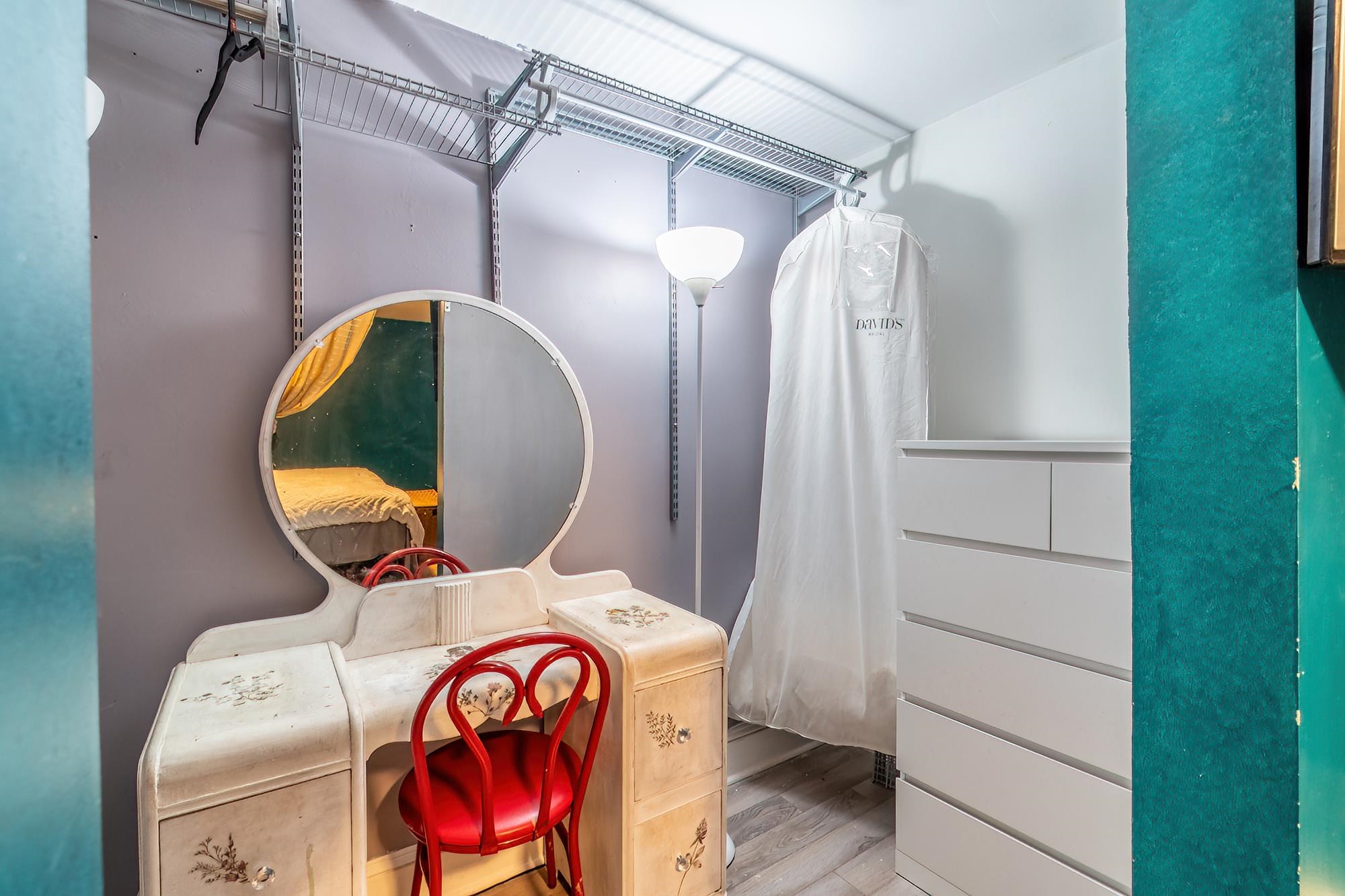 Spacious closet featuring wood finished floors