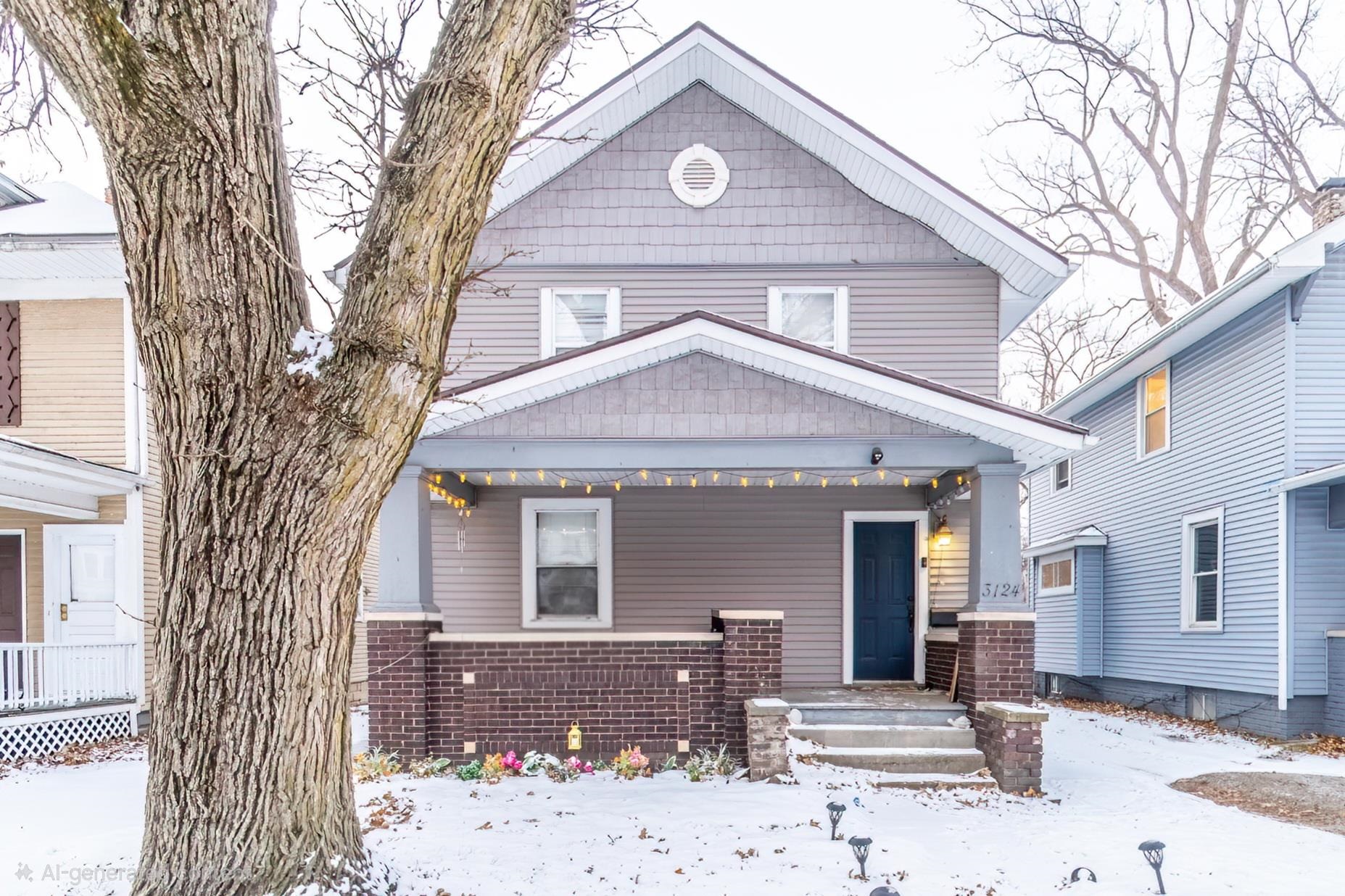 American foursquare style home with covered porch